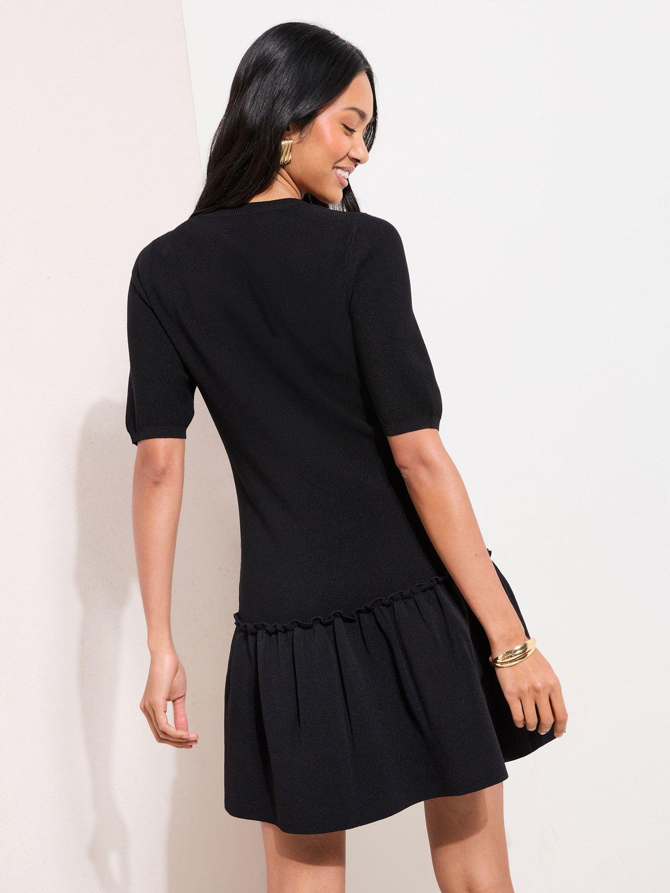 friends-like-these-compact-peplum-hem-mini-dress-blackstillFront