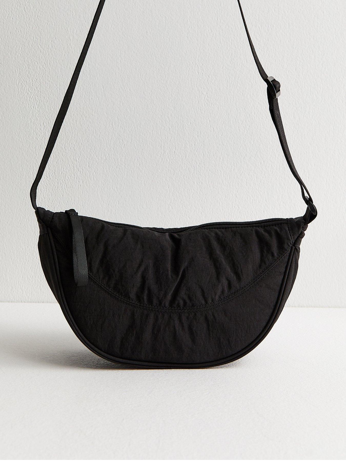 Image 1 of 4 of New Look Plain Curved Crossbody Bag - Black