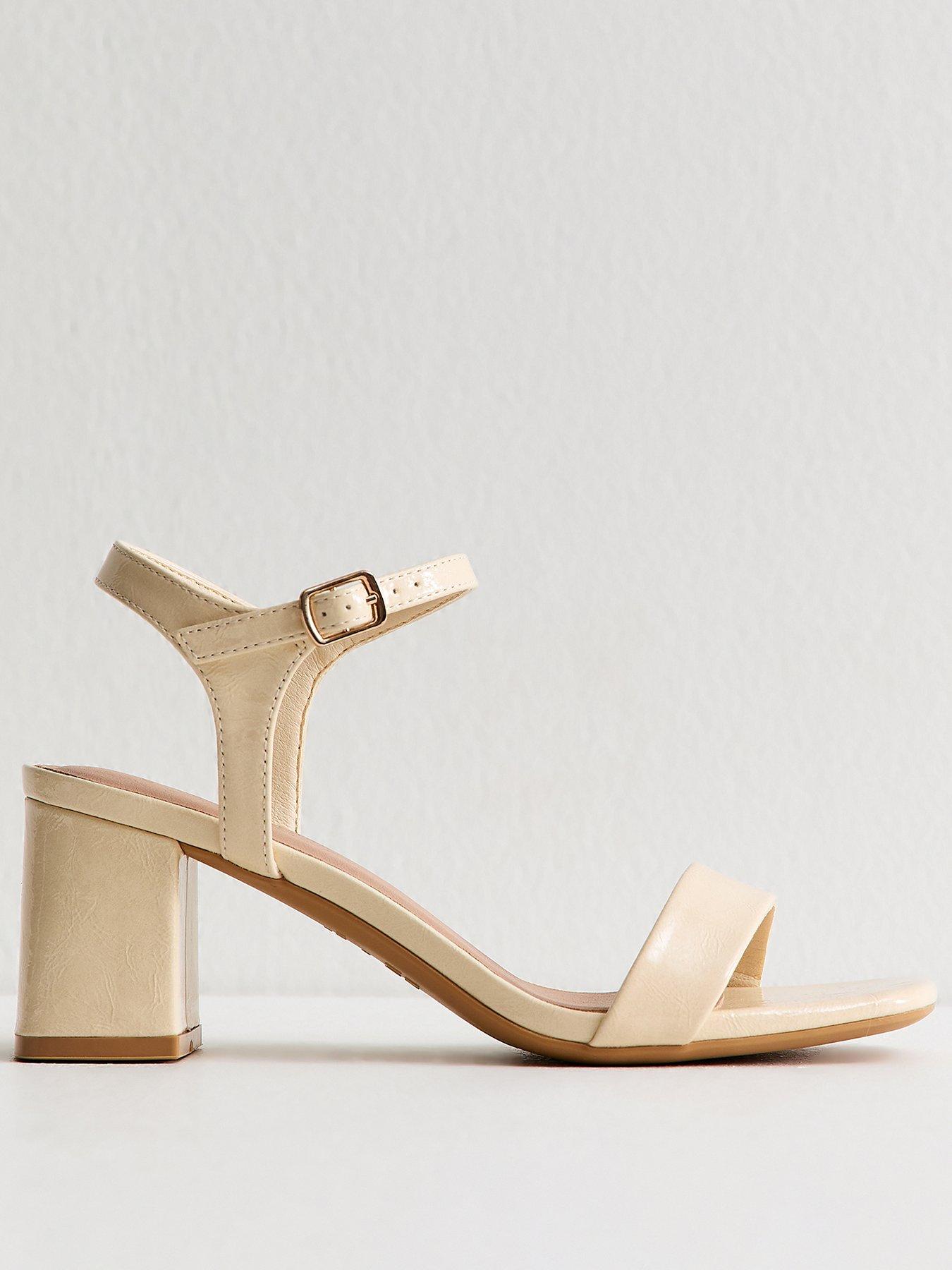 new-look-light-yellow-faux-leather-block-heel-sandalsstillFront
