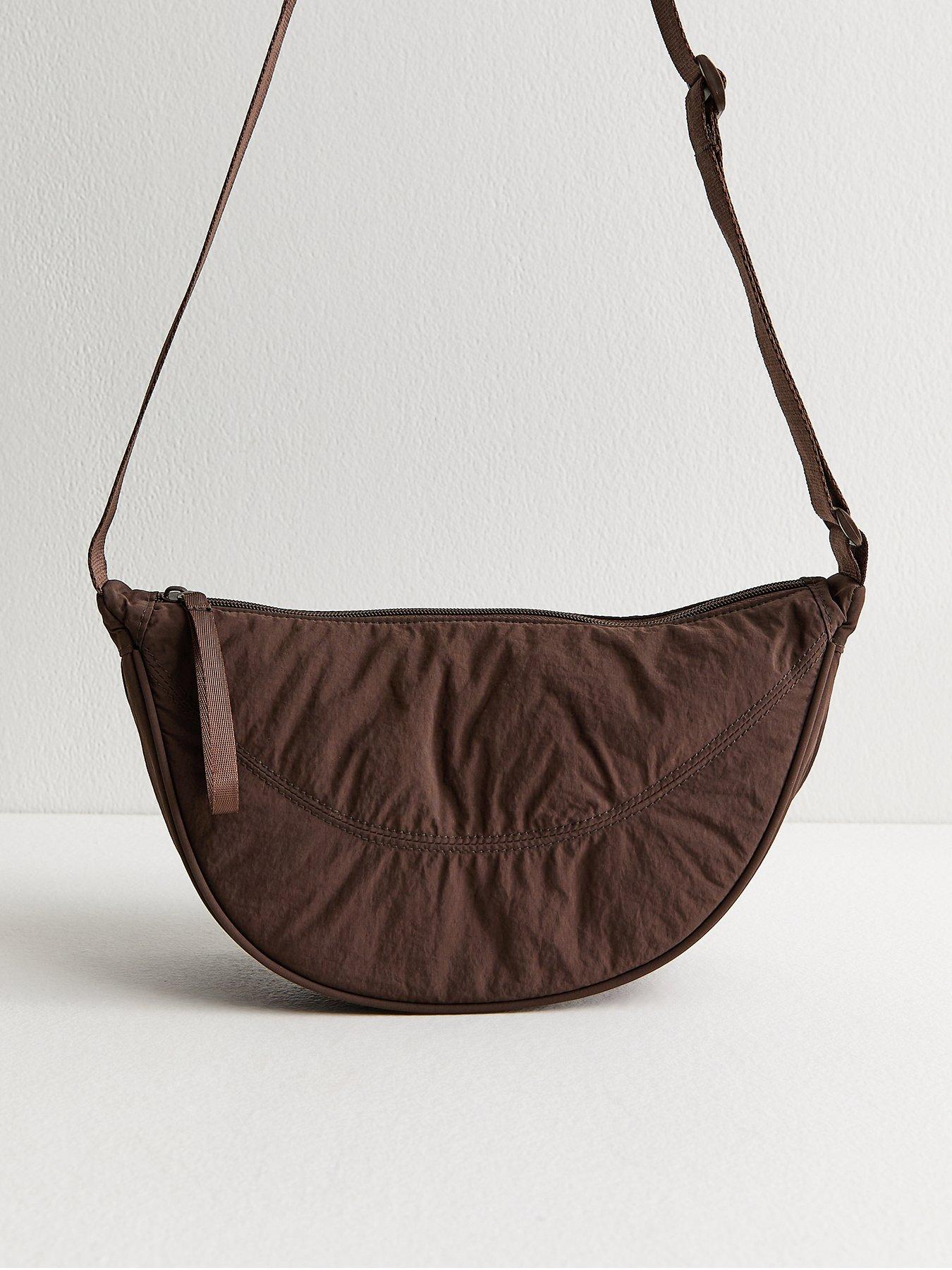 Image 1 of 4 of New Look Plain Curved Crossbody Bag - Dark Brown