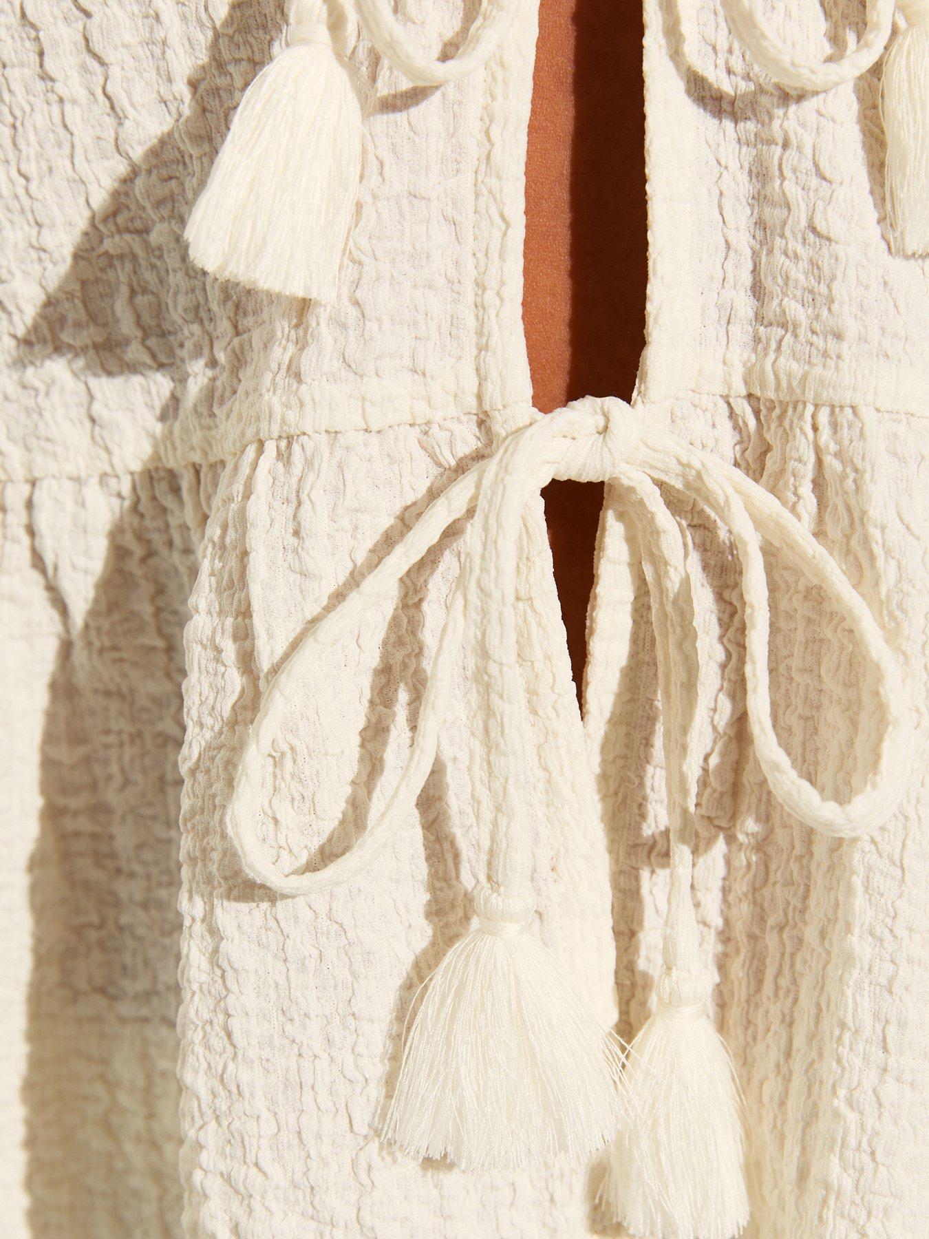 Image 6 of 7 of New Look Off White Textured Jersey Peplum Beach Top