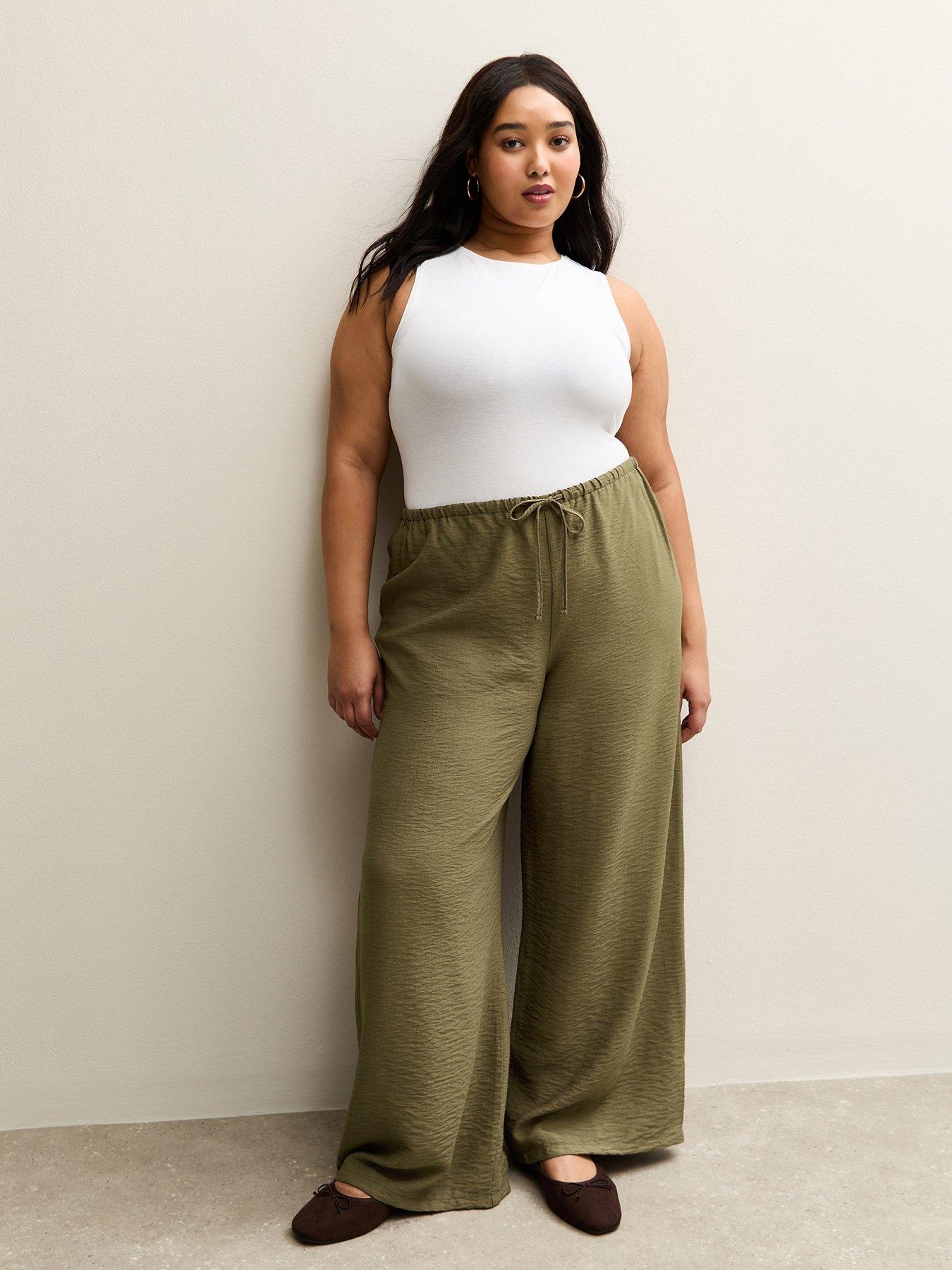 Image 1 of 5 of New Look Curve Wide Leg Trousers - Khaki
