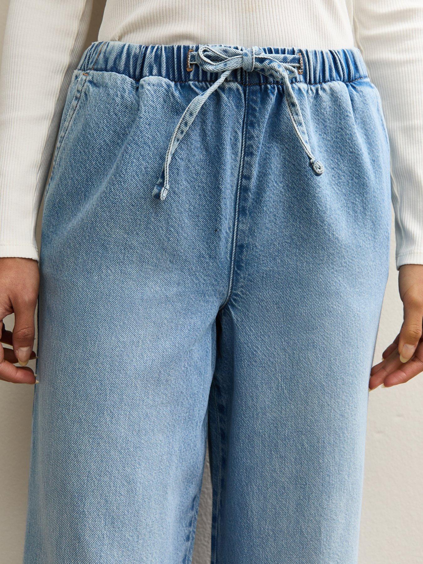 Image 5 of 6 of New Look Denim Wide Leg Drawstring Waist Jeans - Light Blue