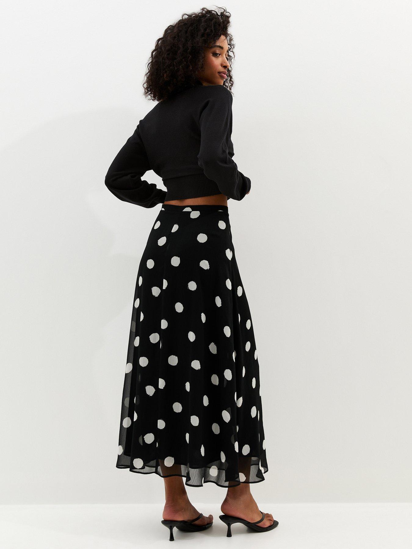 Image 2 of 5 of New Look Chiffon Polka Dot Bias Cut Midi Skirt - Black