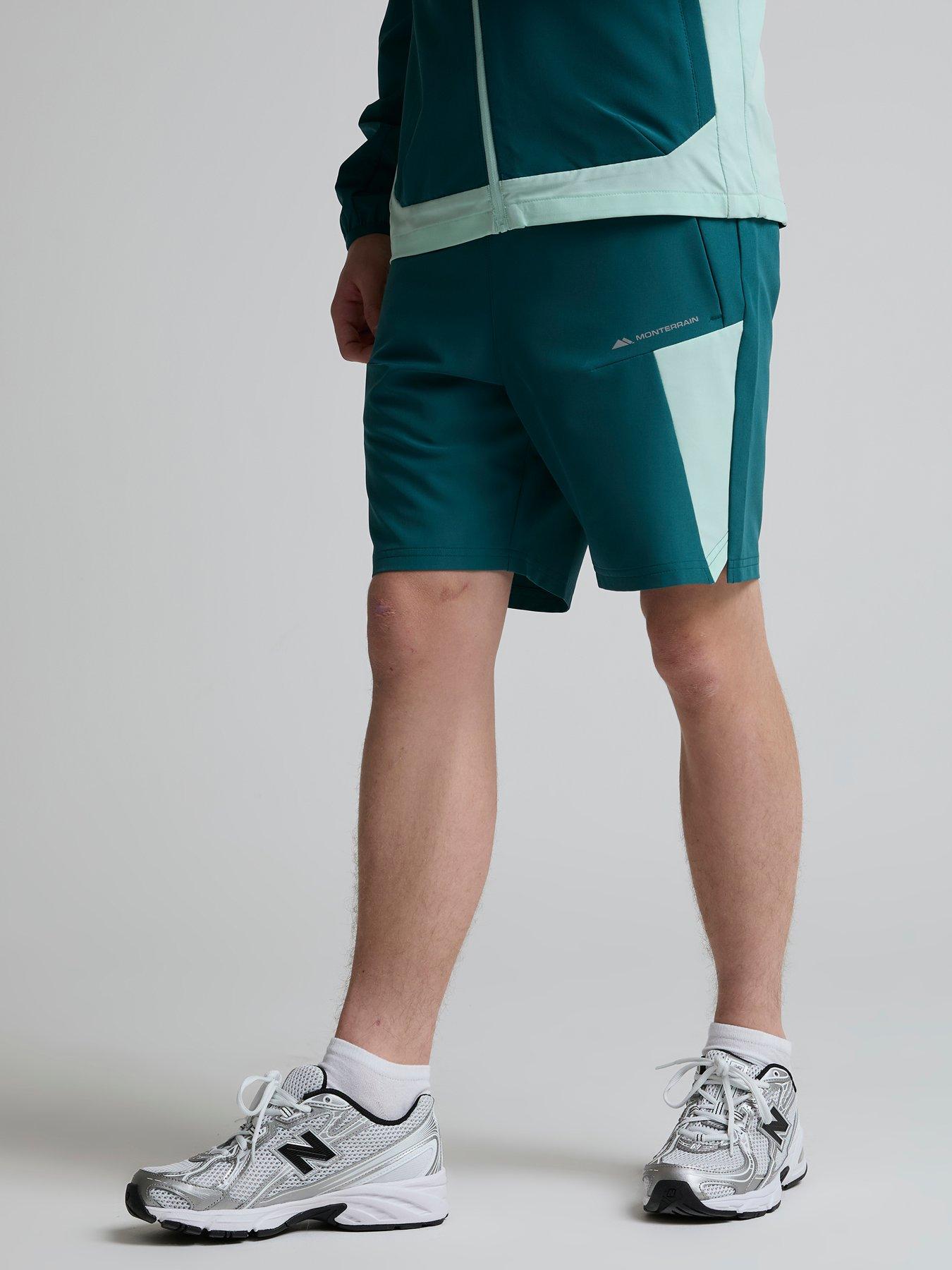 monterrain-kids-deflect-woven-shorts-greenfront