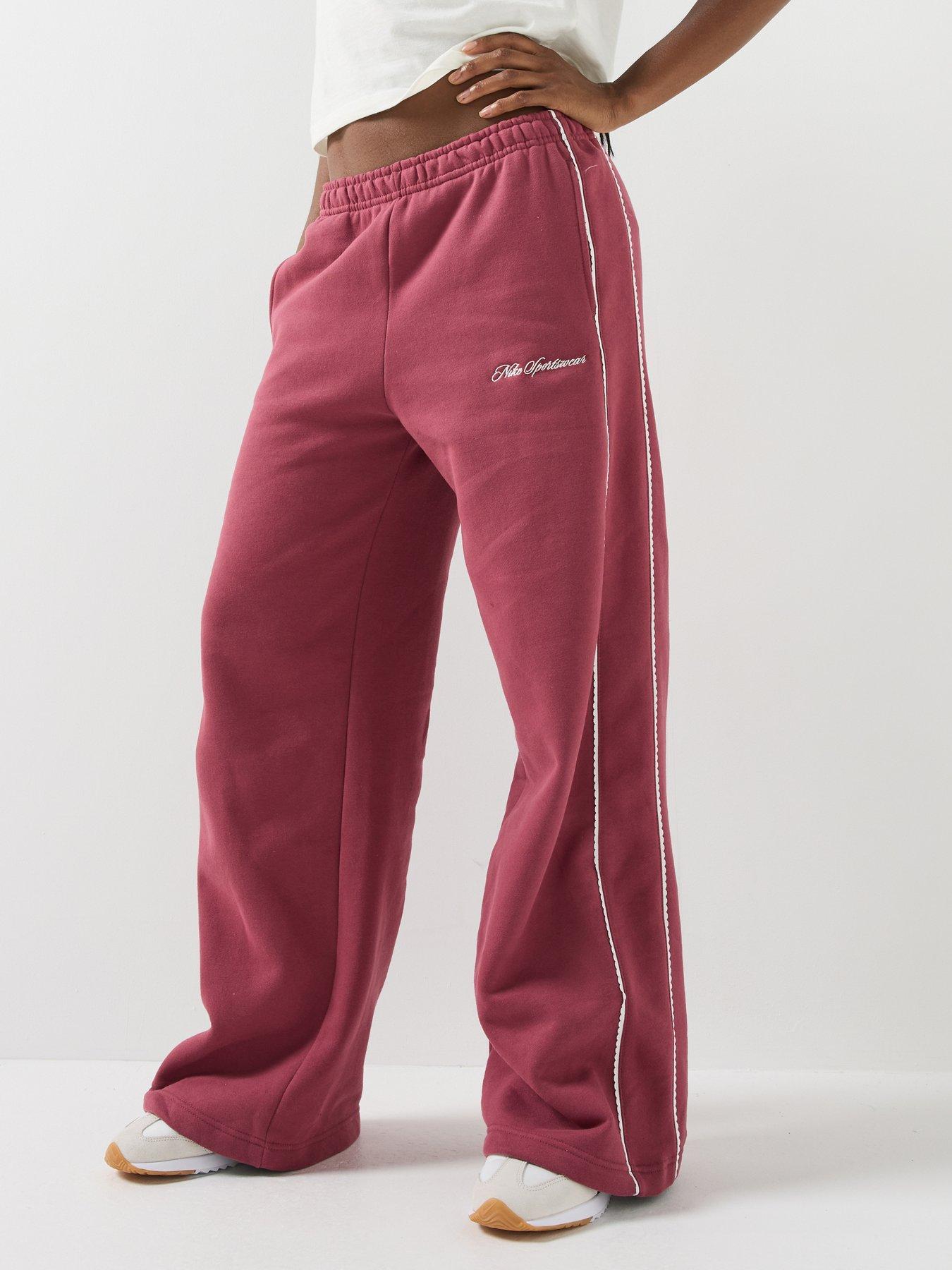 Image 1 of 6 of Nike Womens Studio Fleece Scallop Tape Logo Open Hem Joggers - Pink