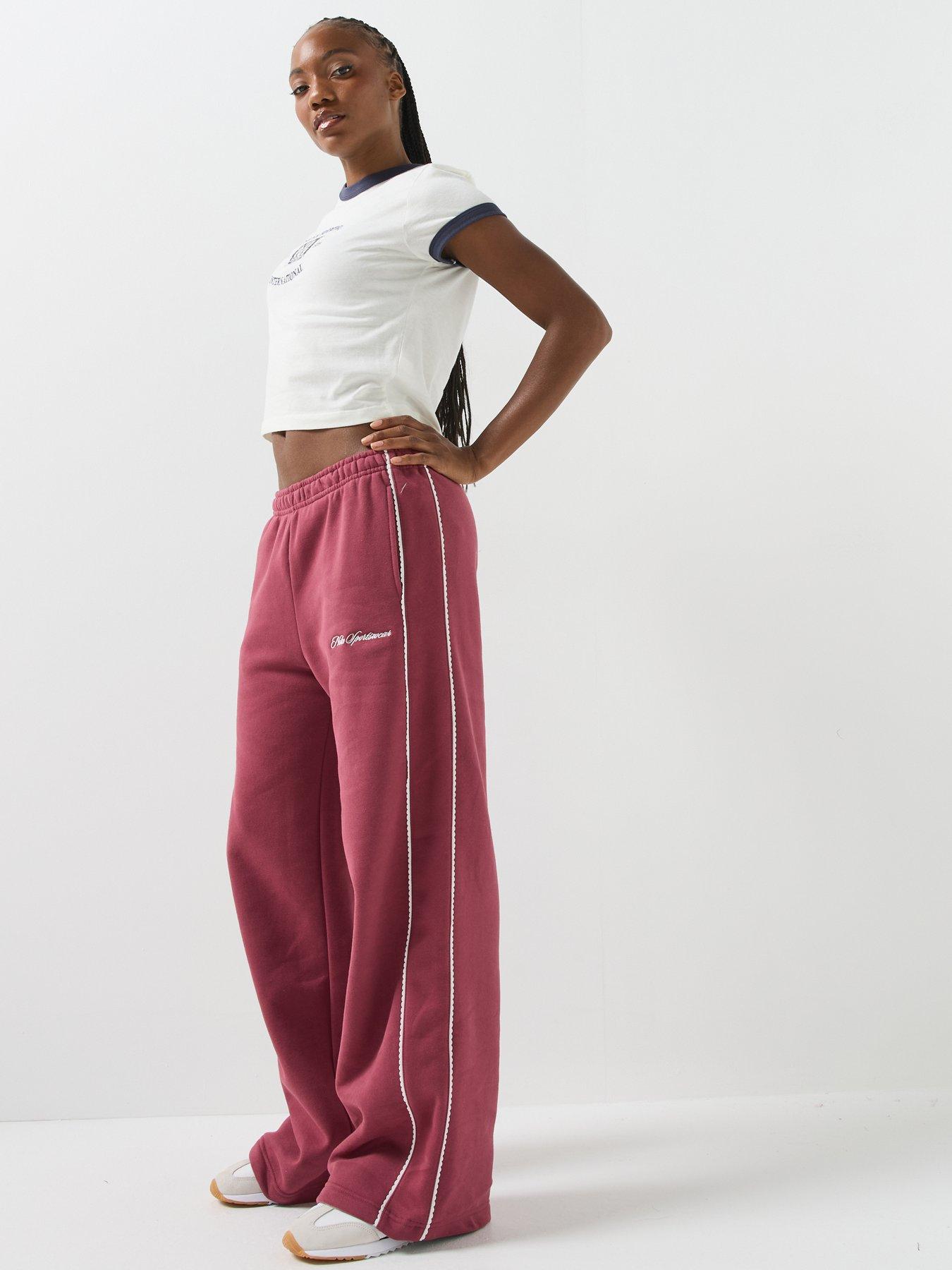 Image 3 of 6 of Nike Womens Studio Fleece Scallop Tape Logo Open Hem Joggers - Pink