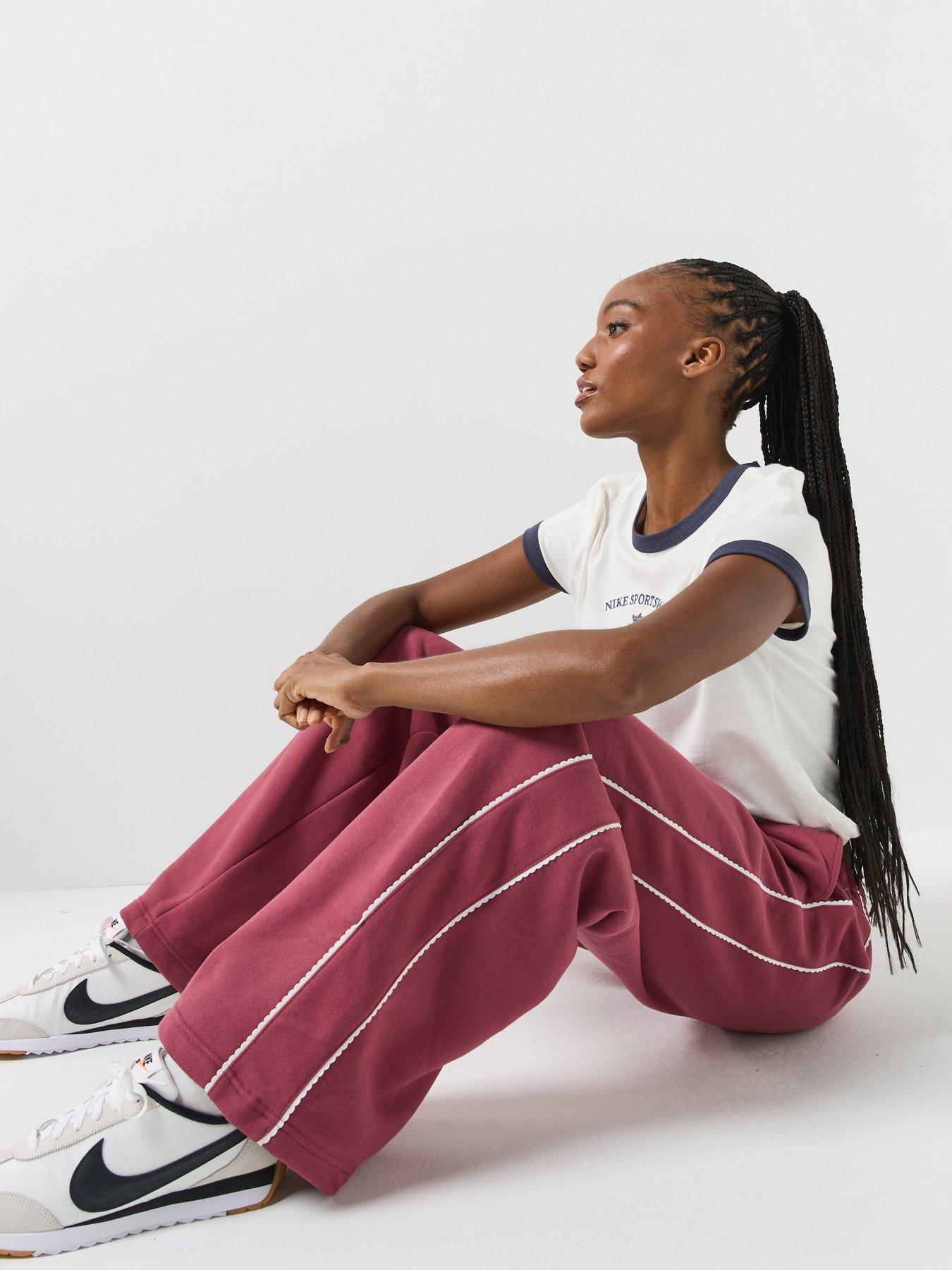 Image 5 of 6 of Nike Womens Studio Fleece Scallop Tape Logo Open Hem Joggers - Pink