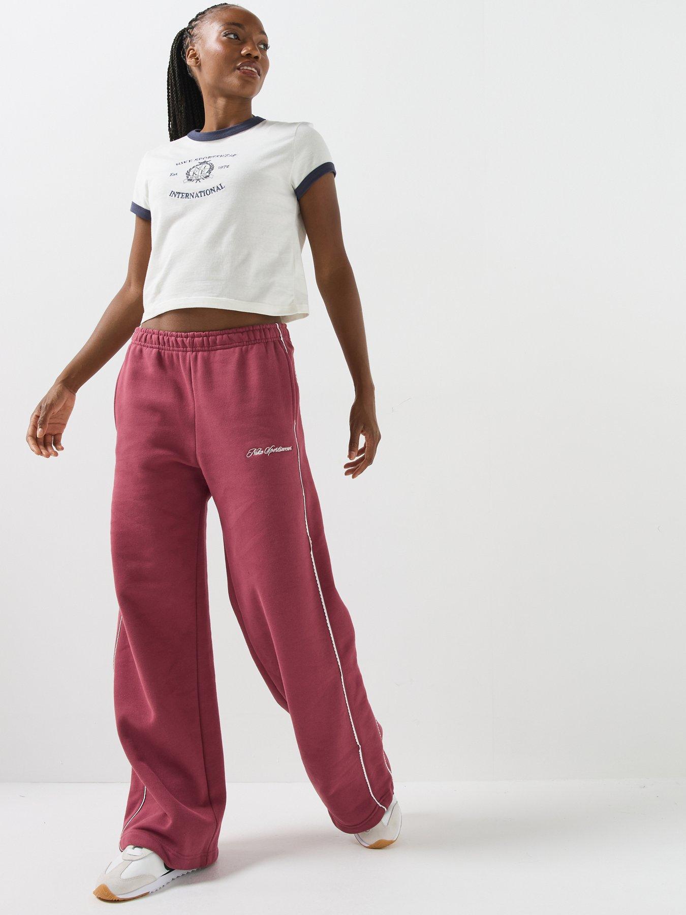 Image 6 of 6 of Nike Womens Studio Fleece Scallop Tape Logo Open Hem Joggers - Pink