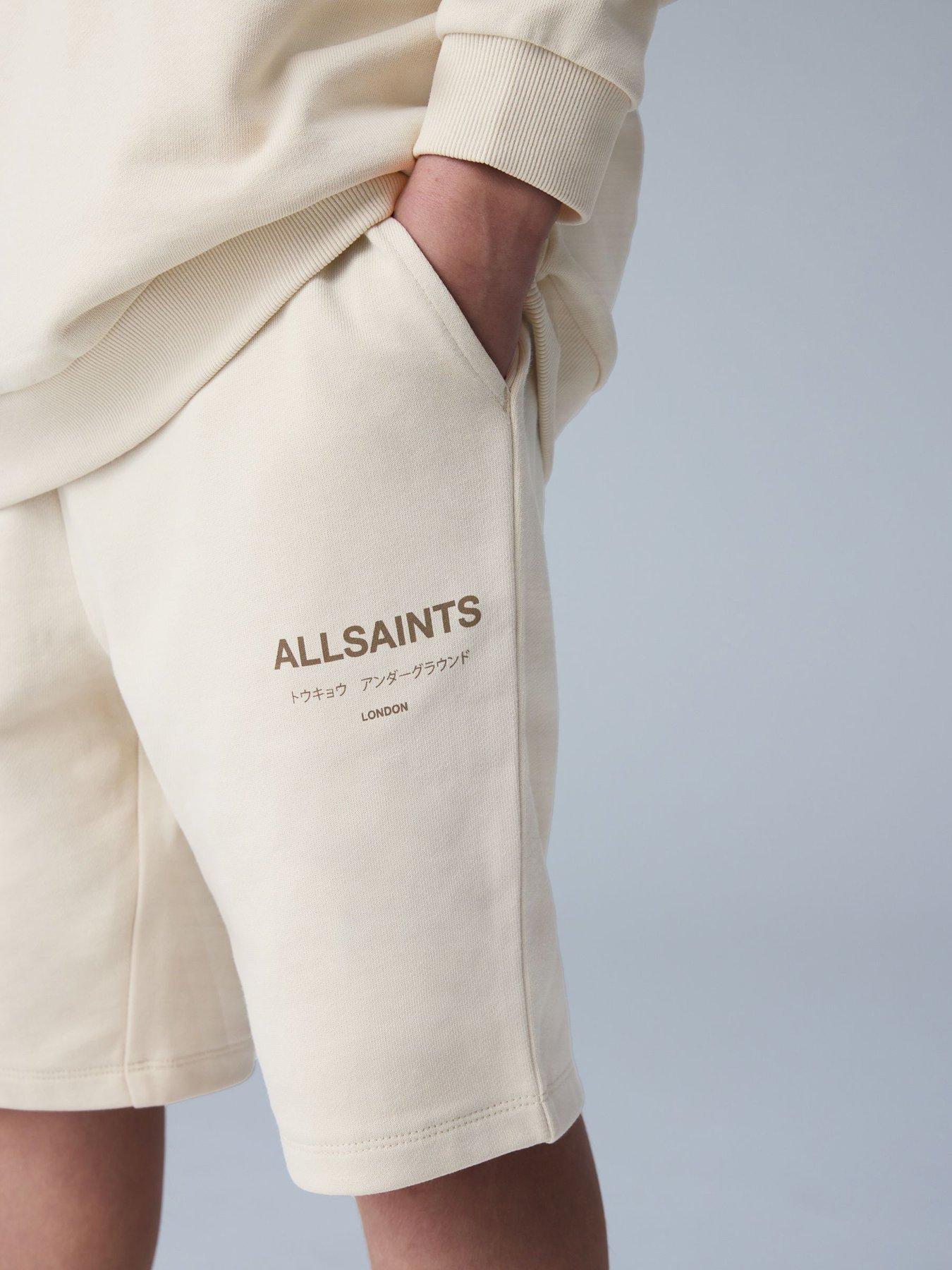 smallsaints-older-boys-underground-logo-shorts-beigeback