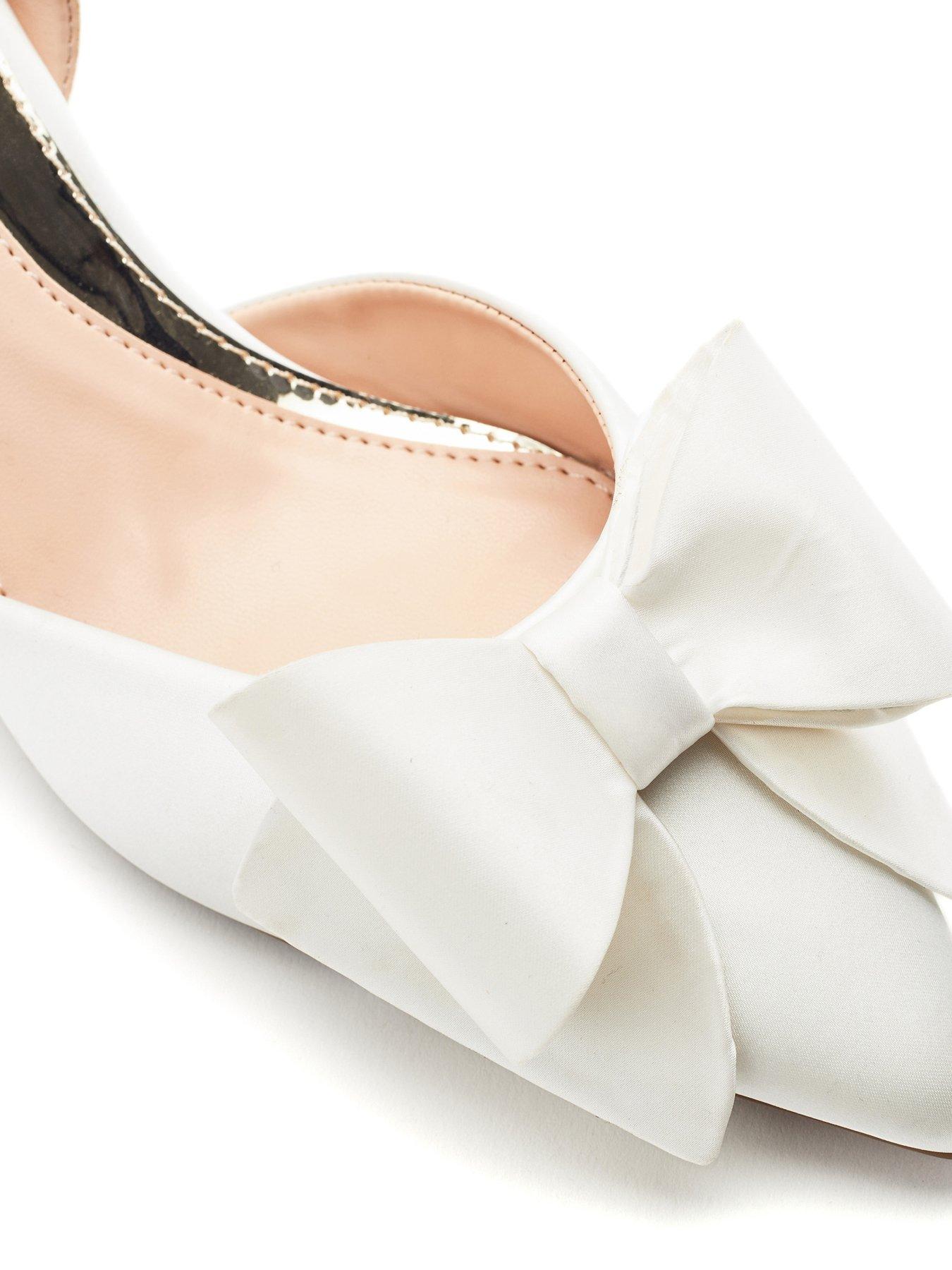 Image 2 of 3 of Moda In Pelle Nahara Off White Satin Ankle Strap Heel With Bow Detail