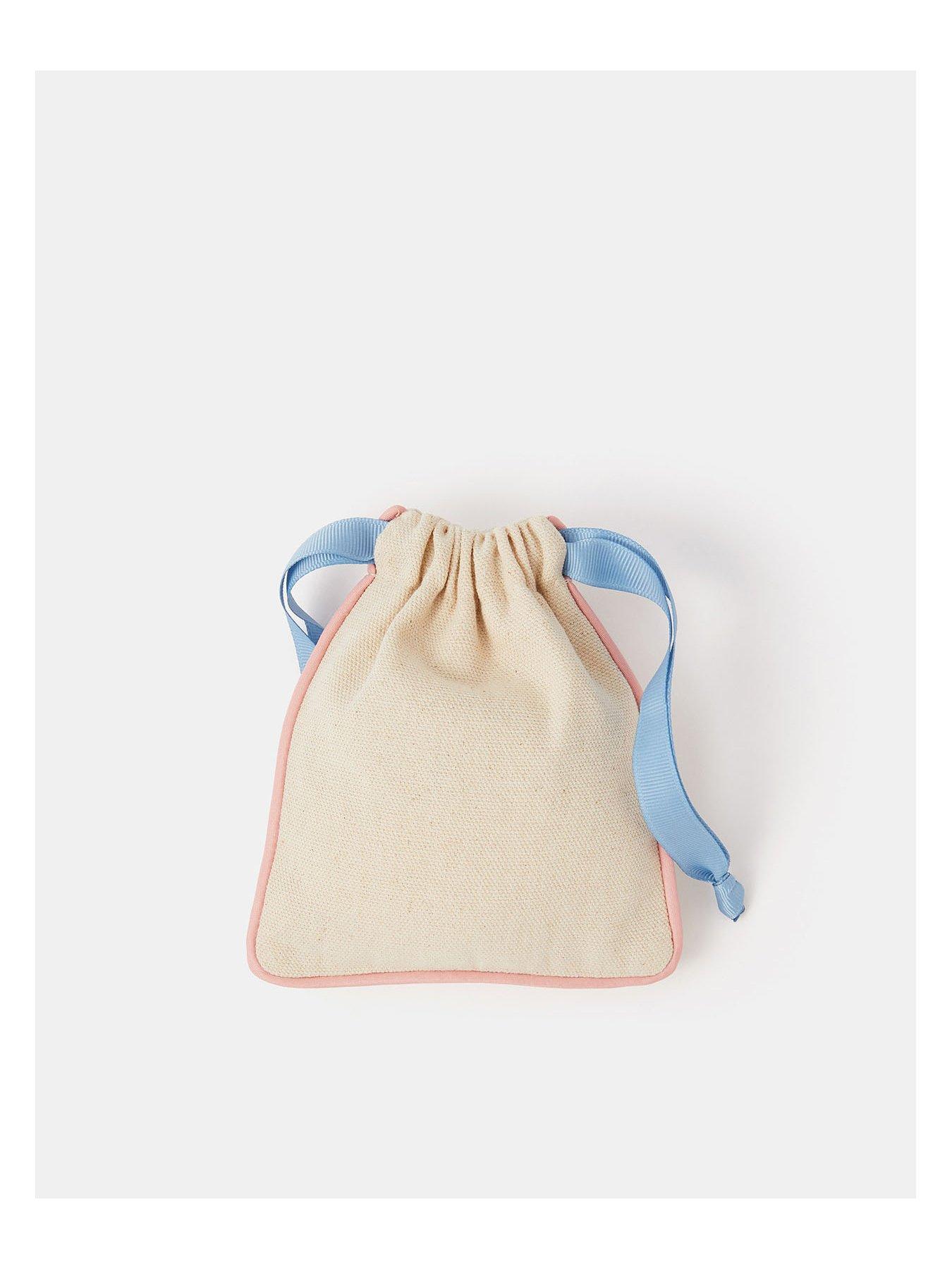 Image 2 of 3 of Accessorize Cupid Embroidered Drawstring Pouch - Cream