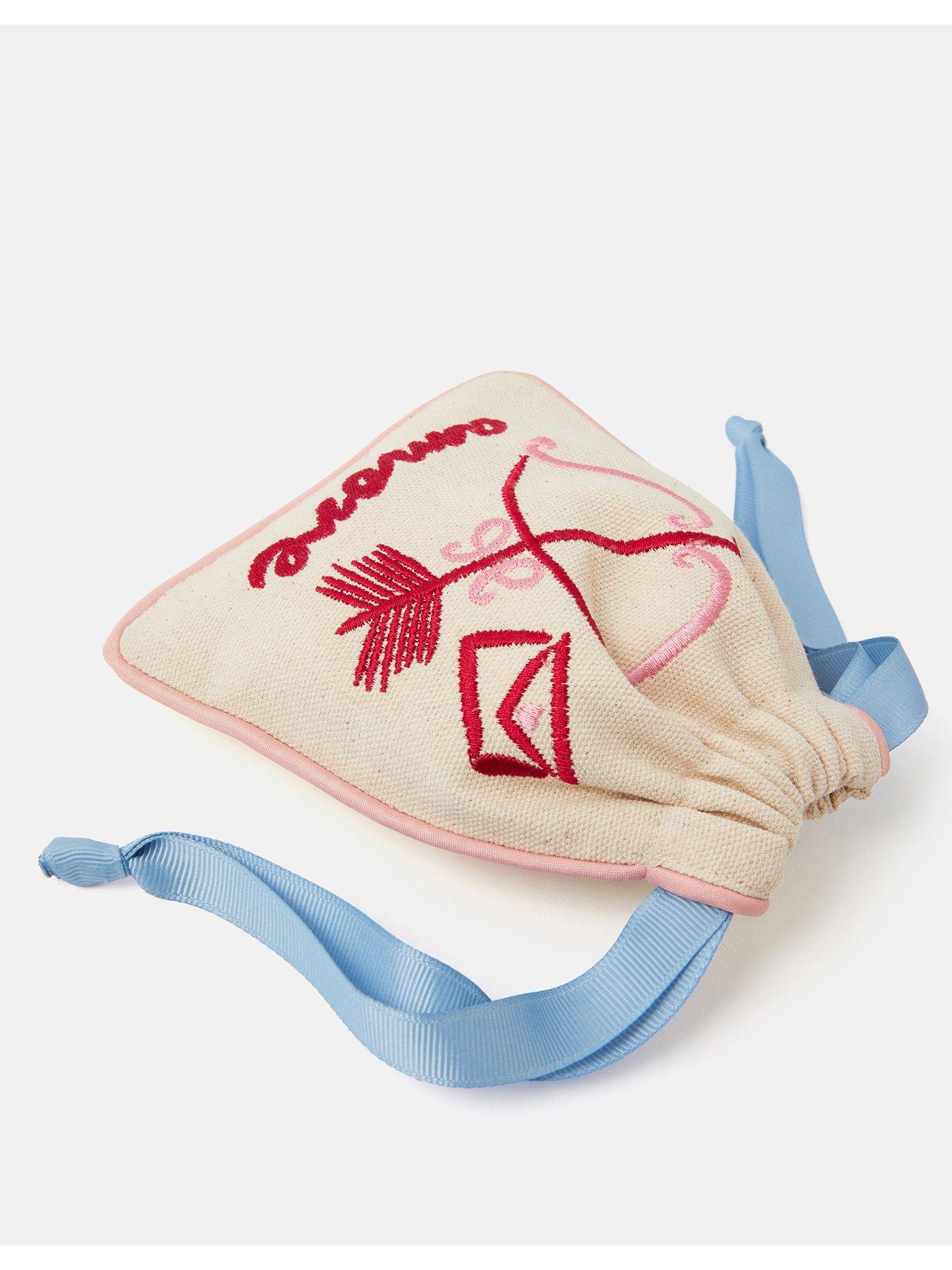 Image 3 of 3 of Accessorize Cupid Embroidered Drawstring Pouch - Cream