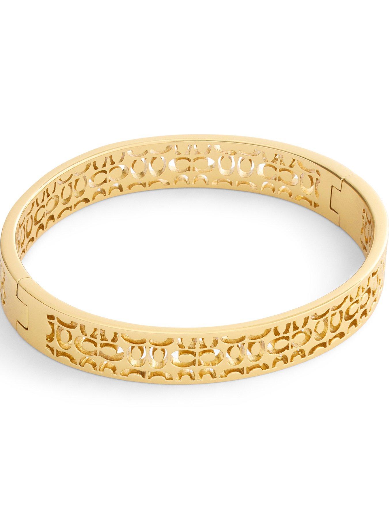 coach-quilted-c-hinged-bangle-goldback