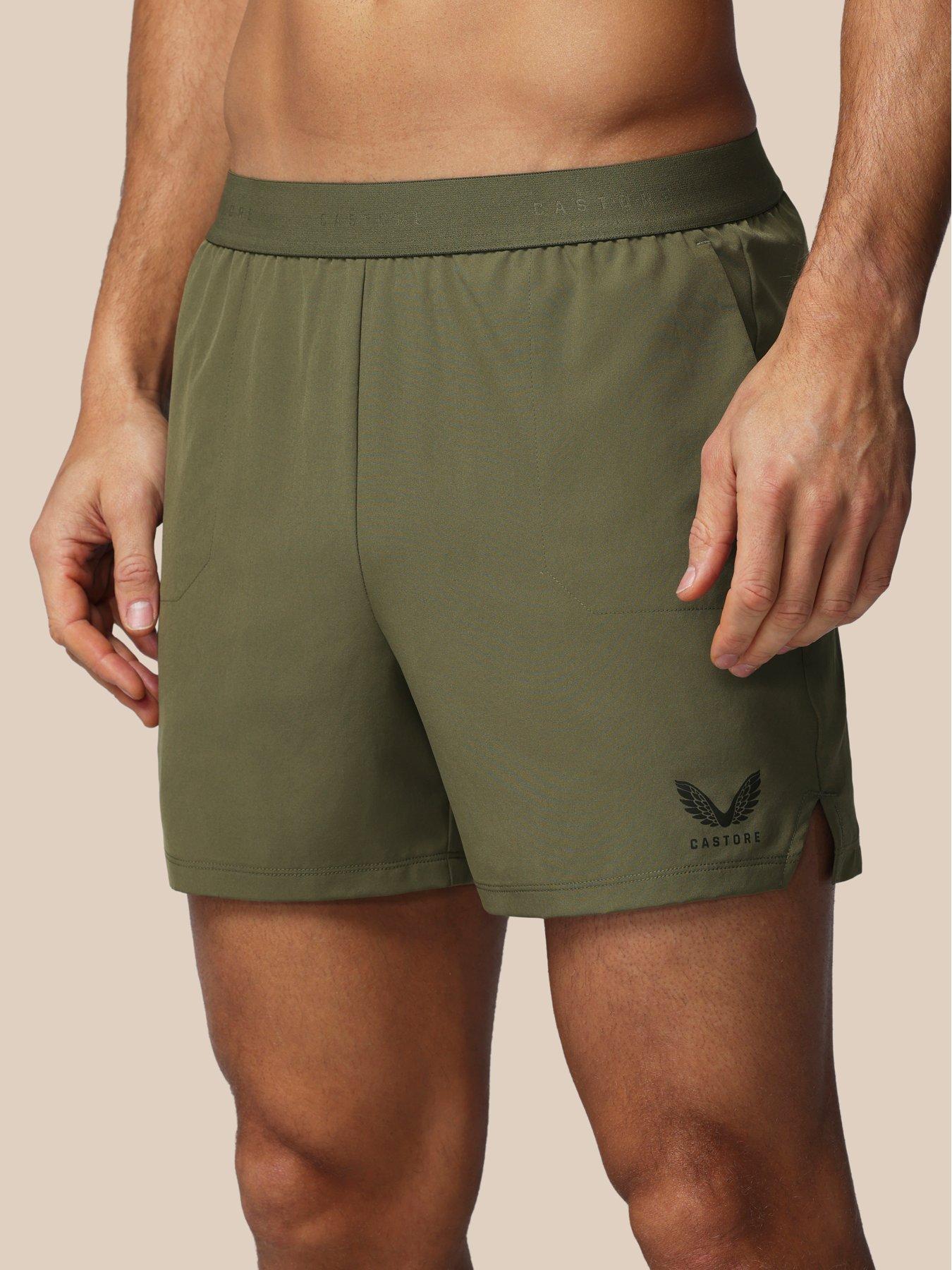 castore-mens-training-7-inch-branded-elastic-shorts-greenfront