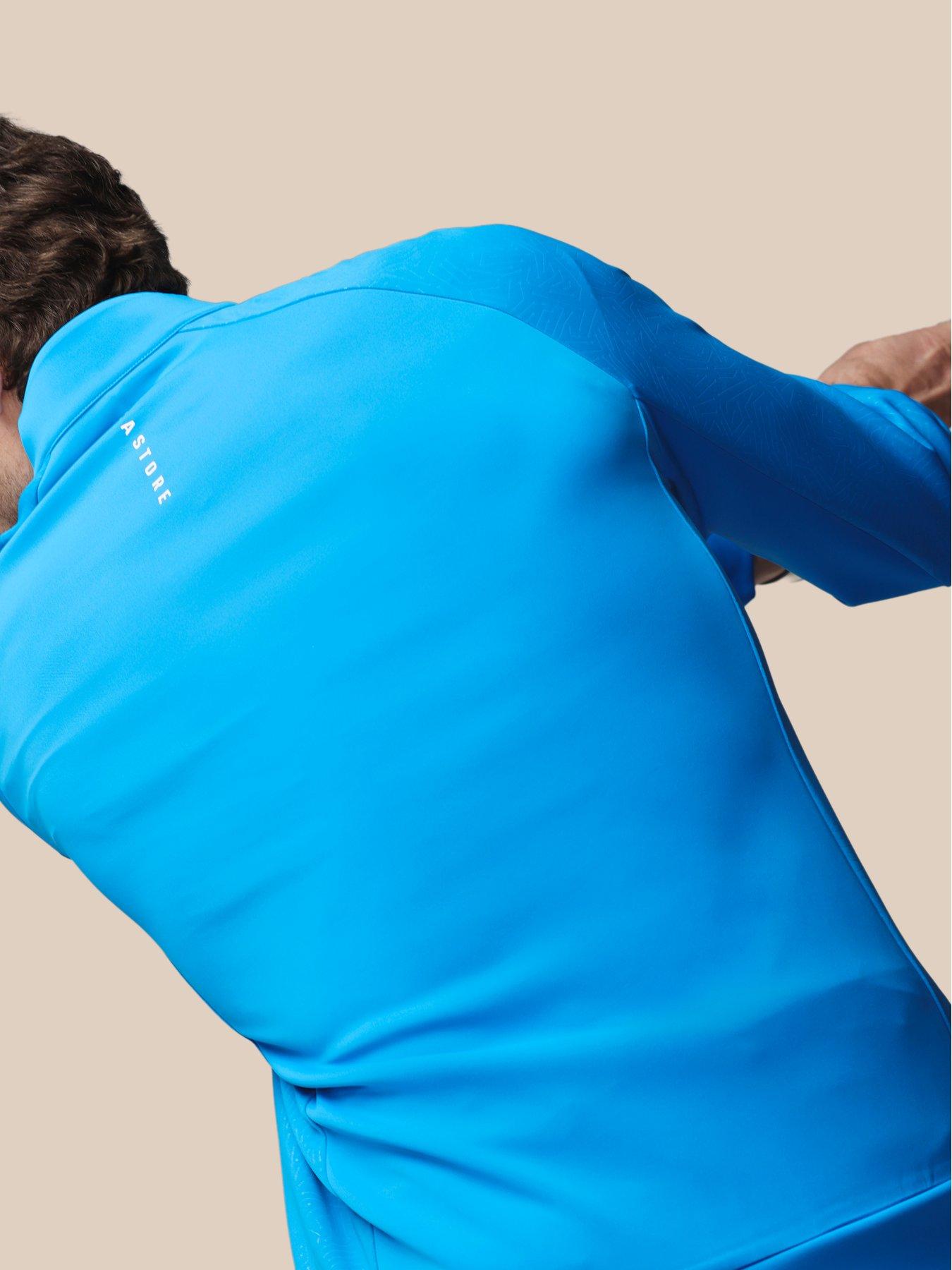 Image 6 of 7 of Castore Mens Golf Flex Debossed 1/4 Zip Top- Blue
