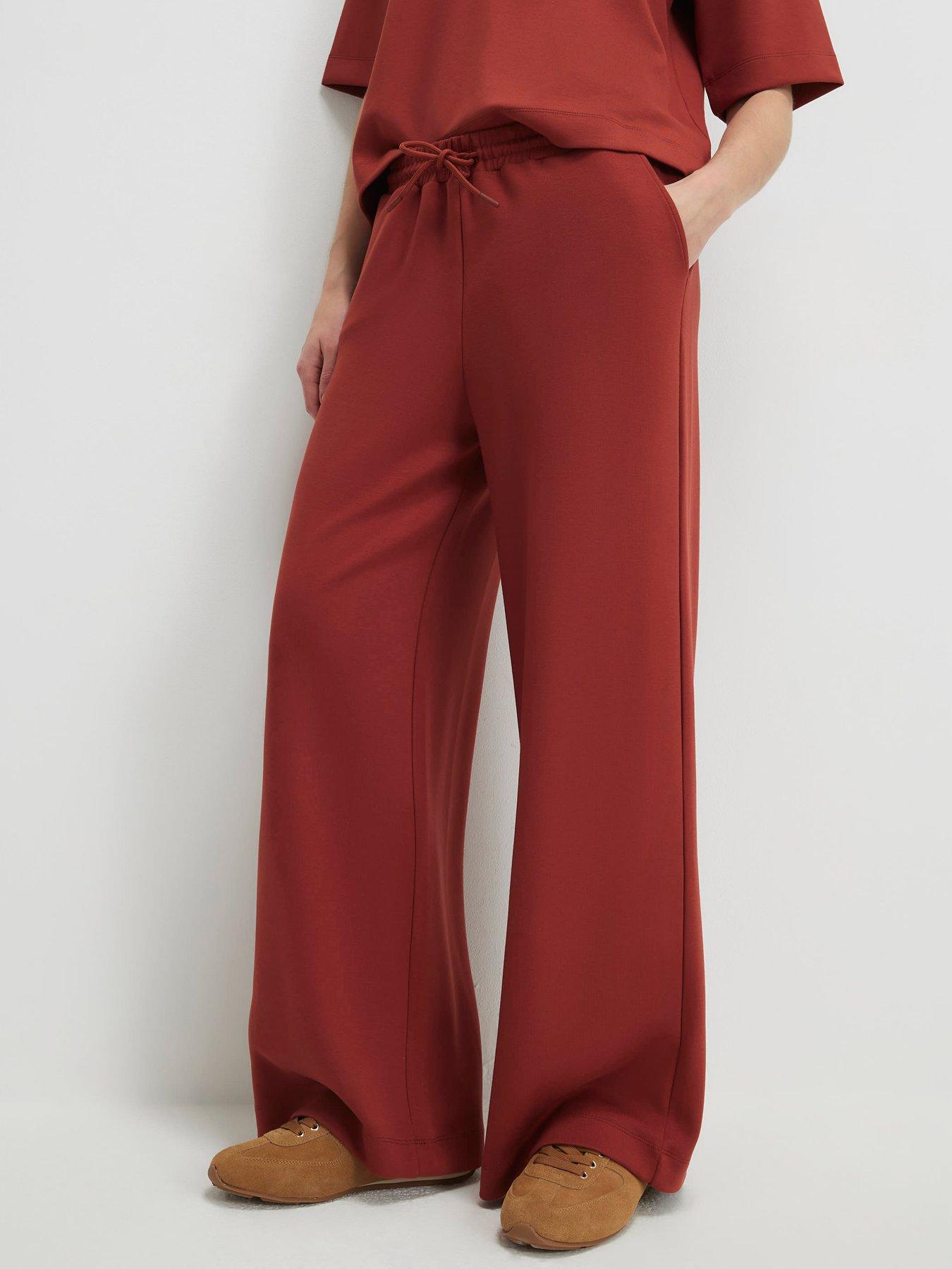 Image 1 of 4 of River Island High Waisted Premium Wide Leg Joggers - Red