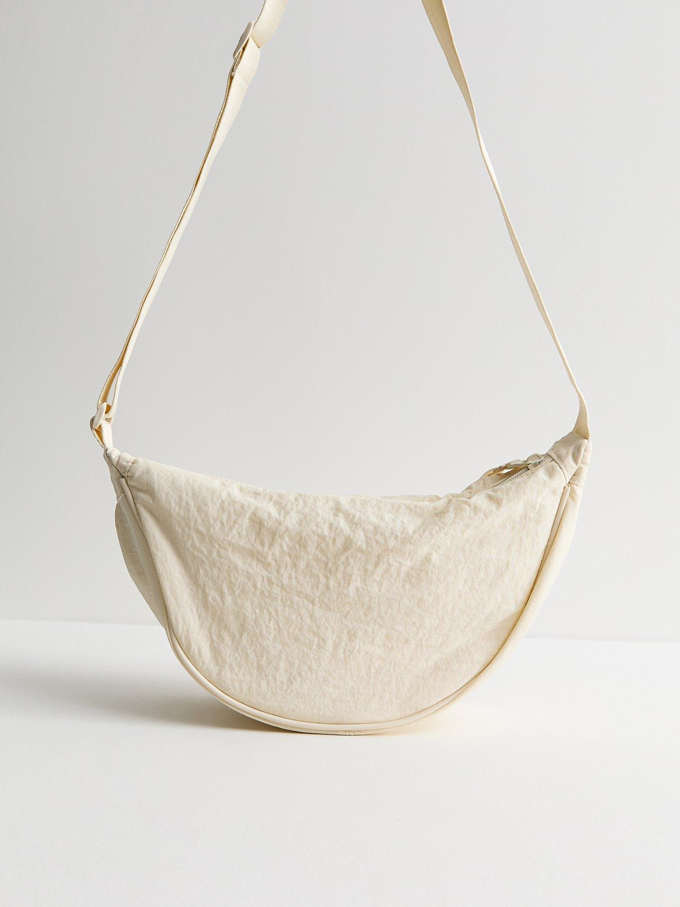 Image 3 of 5 of New Look Plain Curved Crossbody Bag - Cream