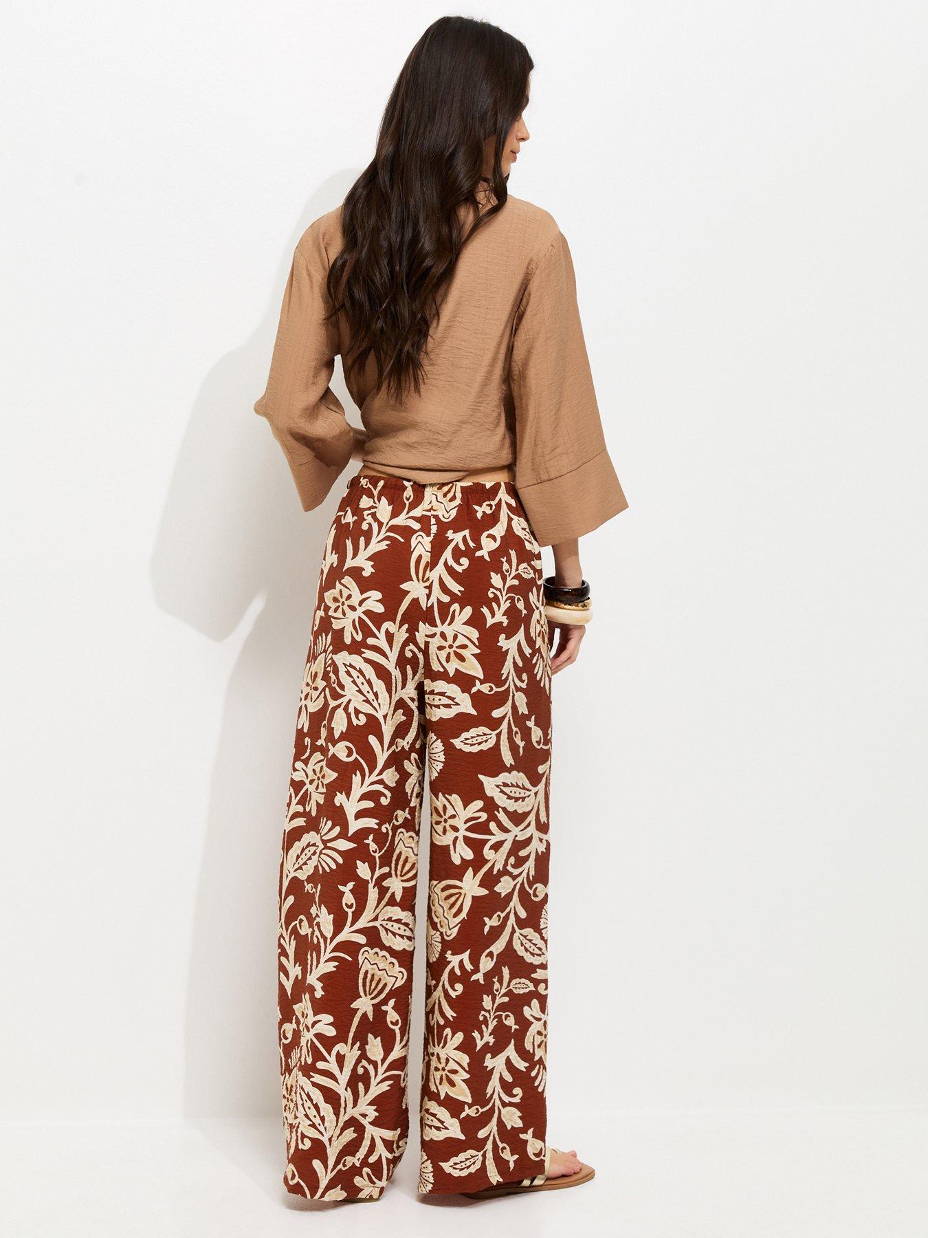 Image 2 of 5 of New Look Folk Leaf Print Wide Leg Trousers - Red