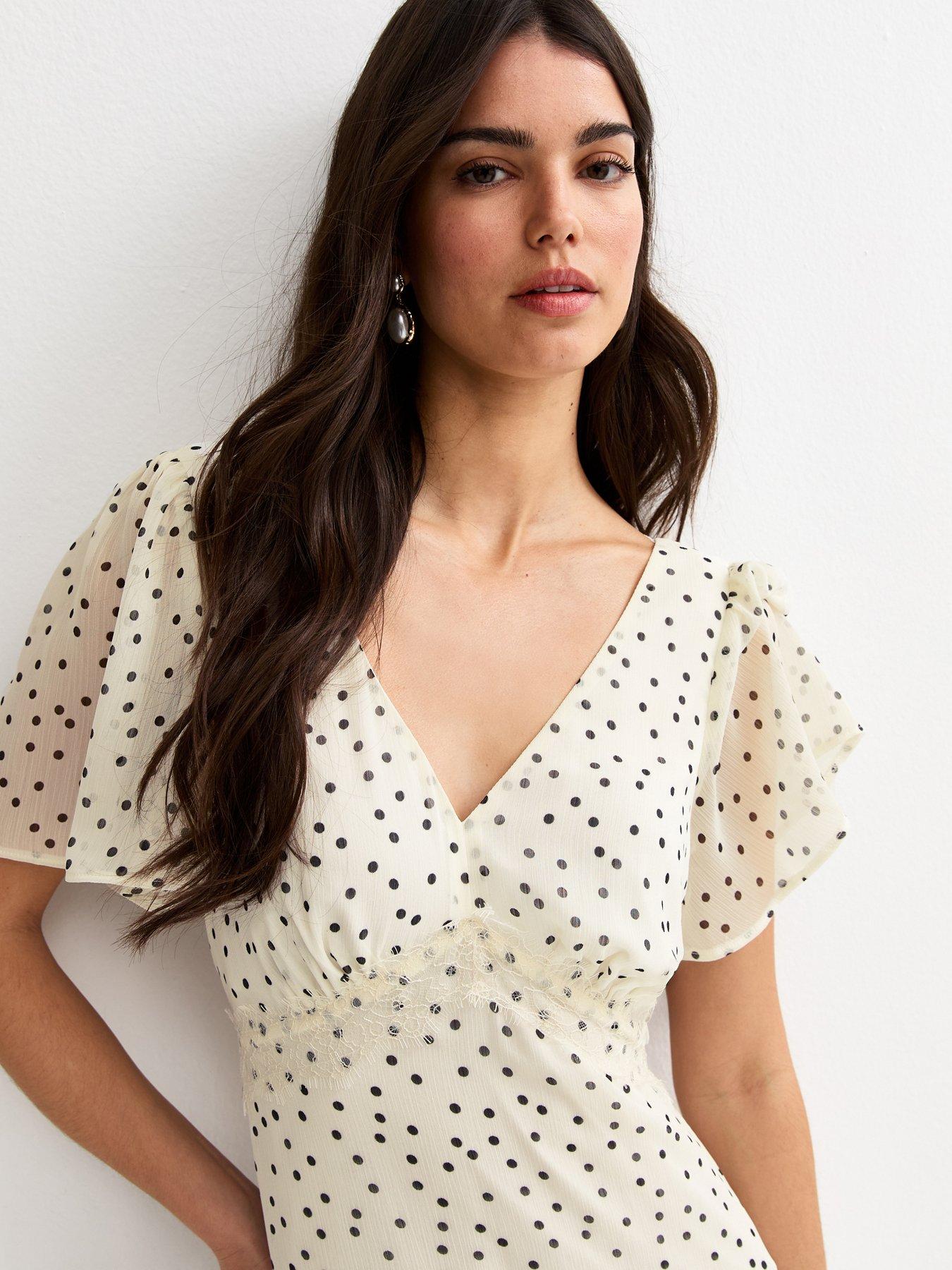 Image 4 of 5 of New Look Cream Polka Dot Chiffon Tiered Midi Dress
