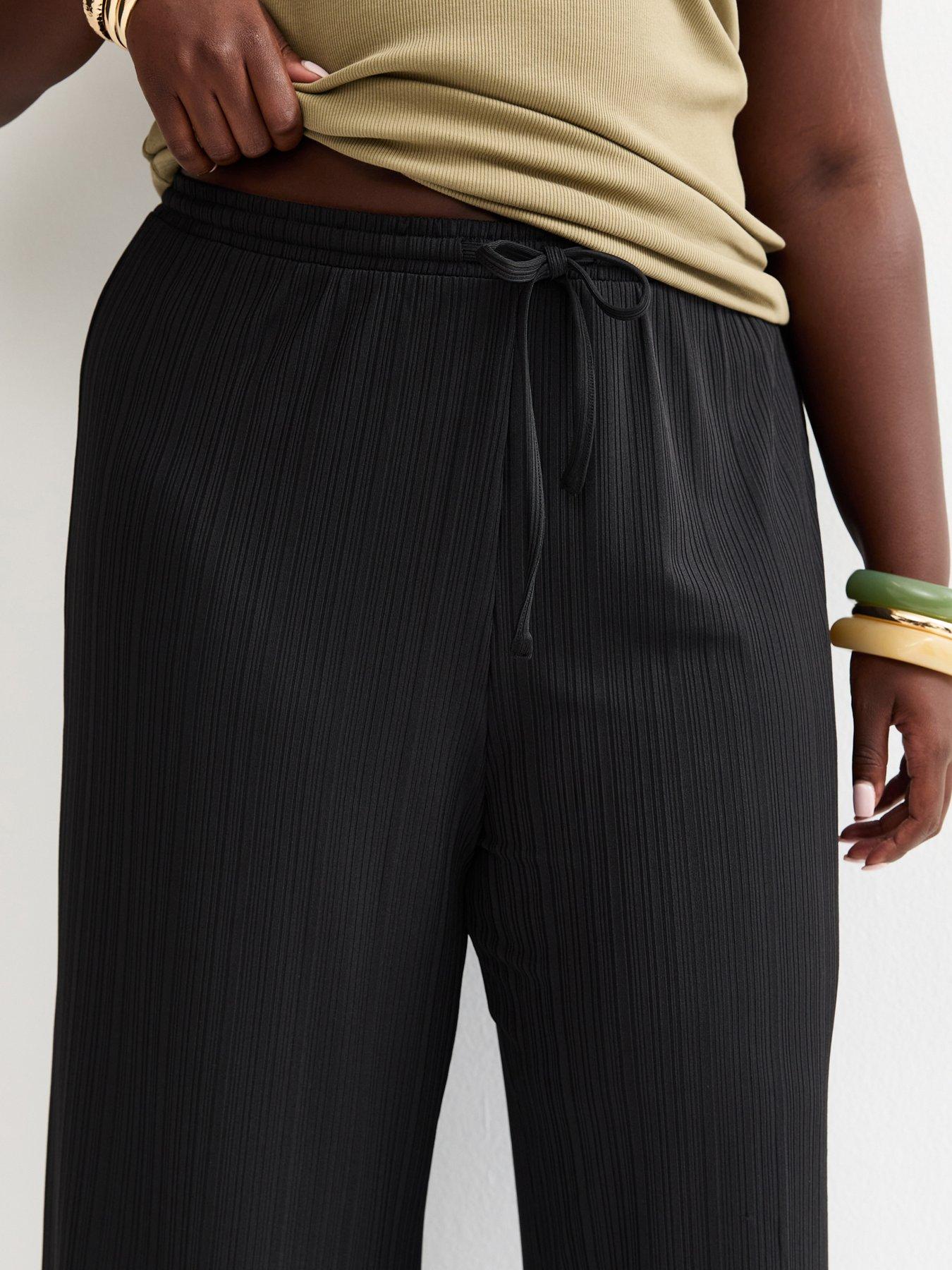 Image 4 of 5 of New Look Curves Black Ribbed Drawstring Cropped Trousers