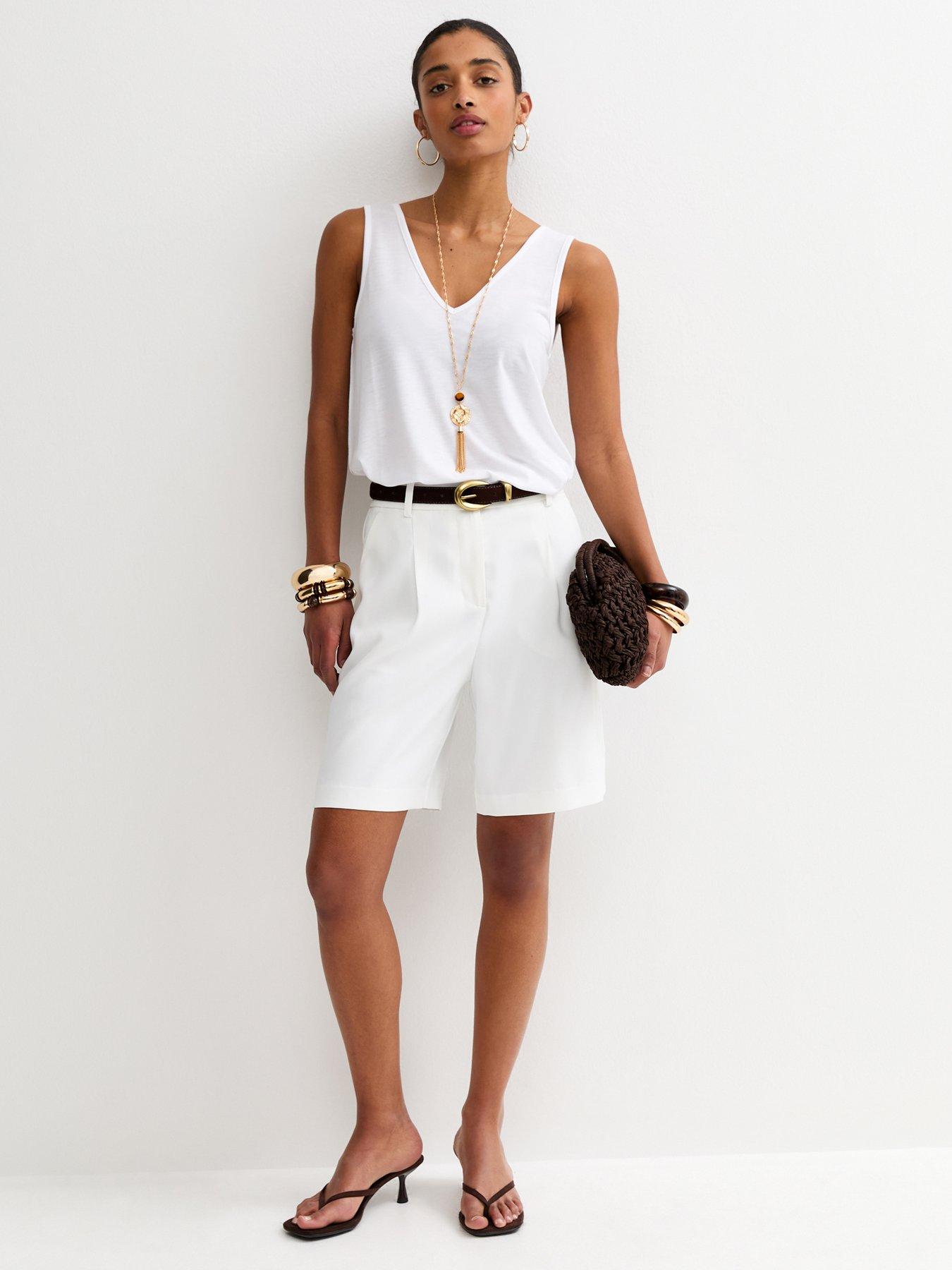 Image 1 of 5 of New Look White Relaxed V Neck Tank Top