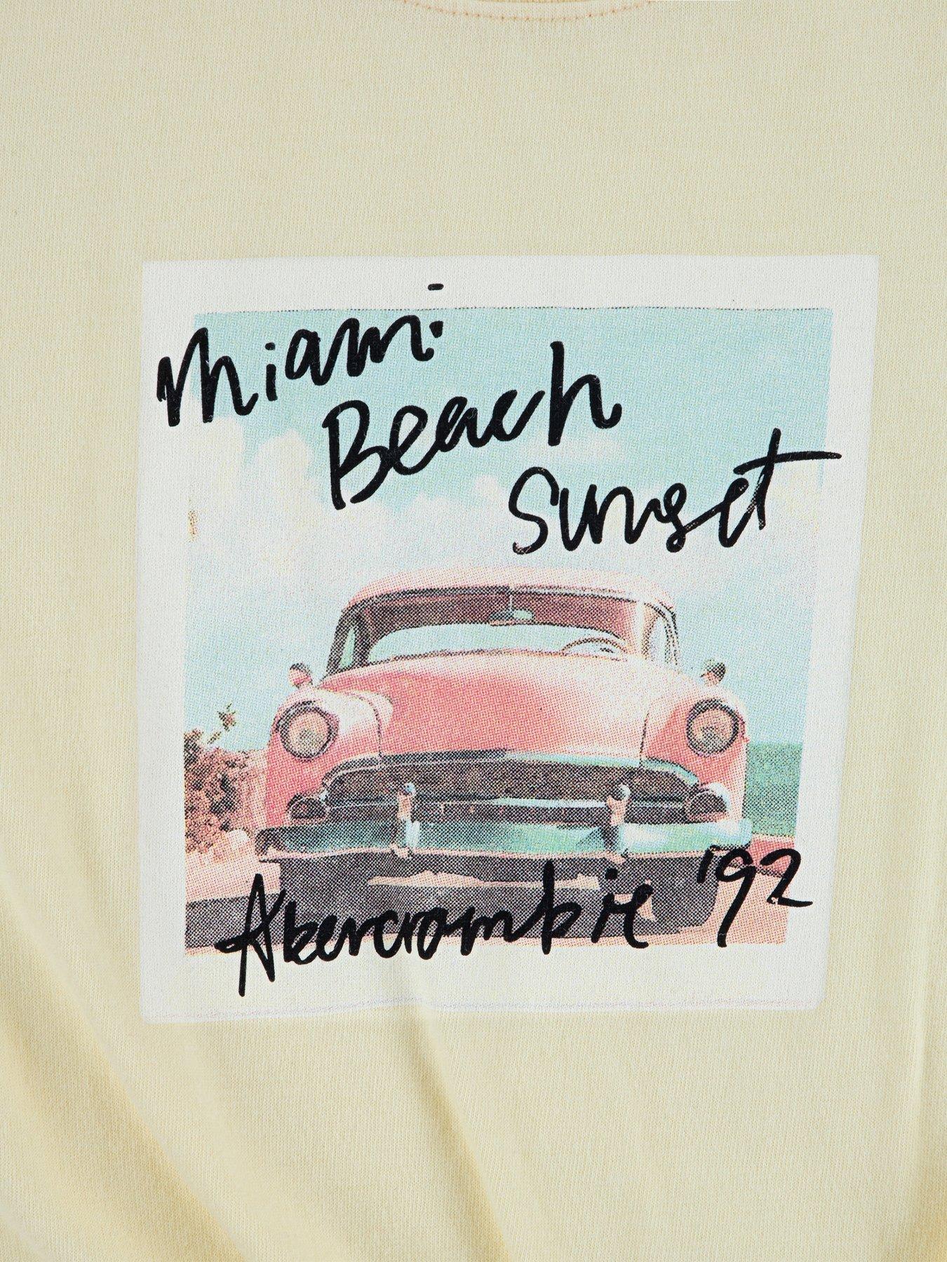 Image 3 of 3 of Abercrombie & Fitch Girls Miami Beach Side Knot Short Sleeve T-Shirt - Yellow