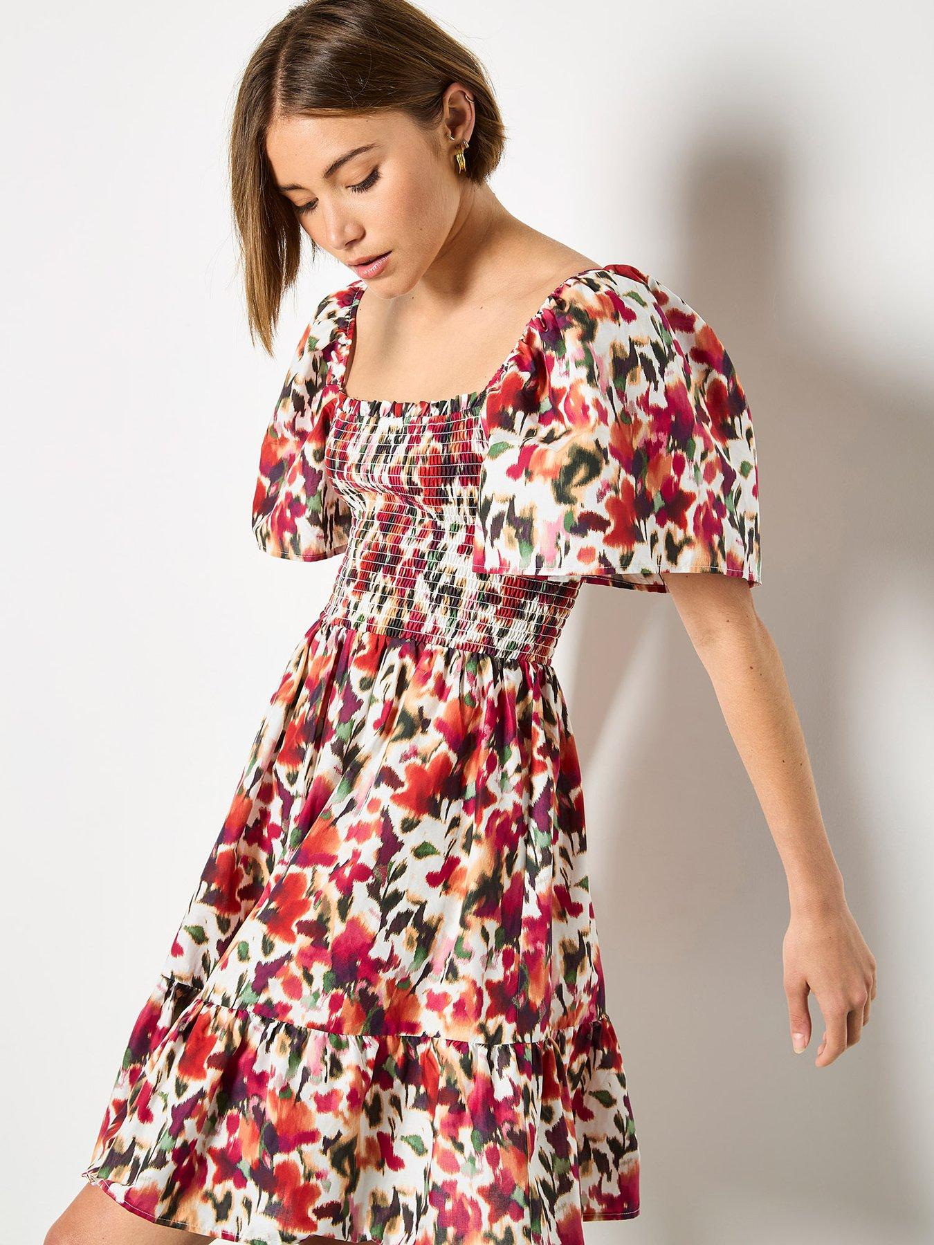 Apricot Apricot Smocked Ikat Floral Cotton Drs