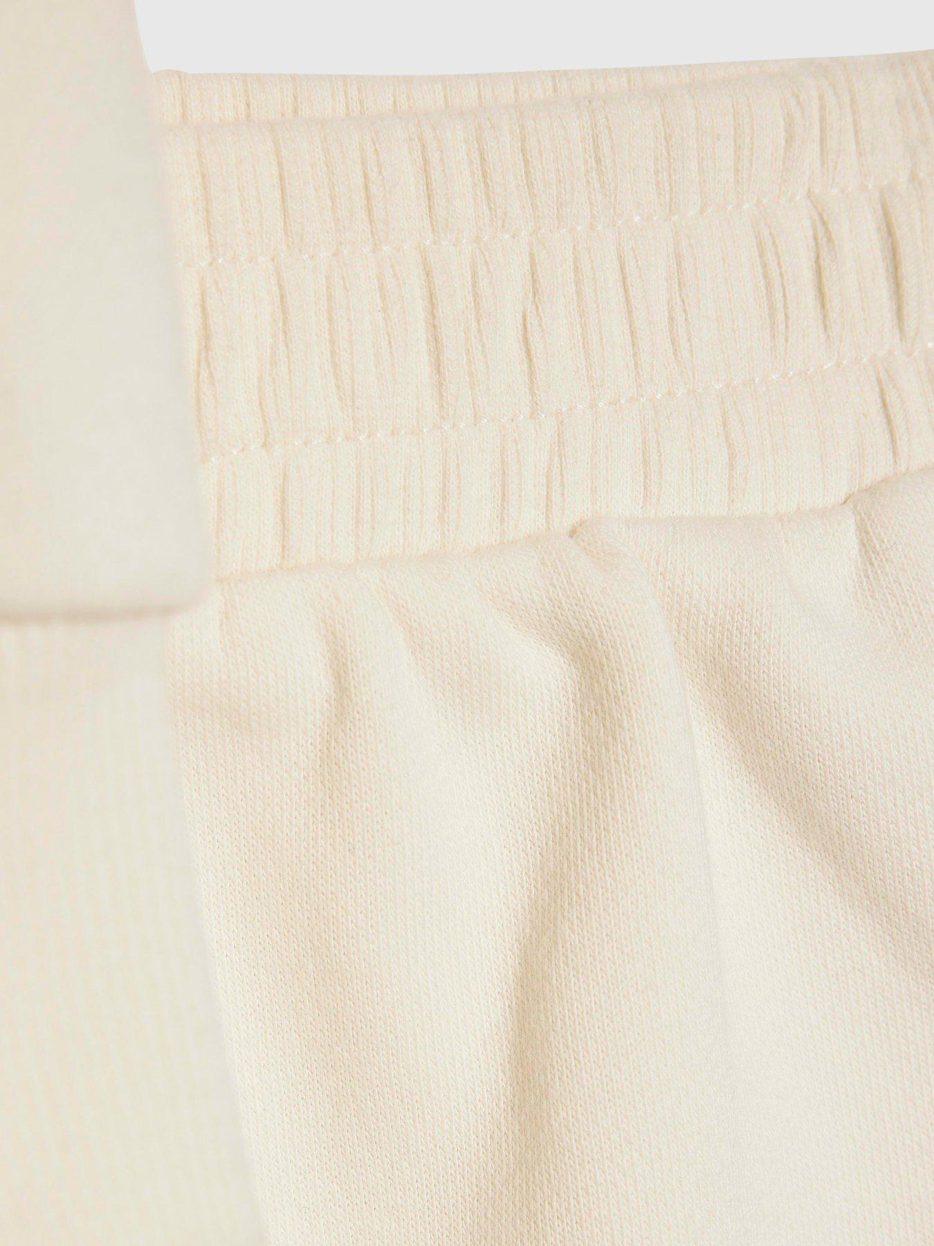 Image 4 of 5 of River Island Older Girls Heart Collar Sweatshirt Set - Cream