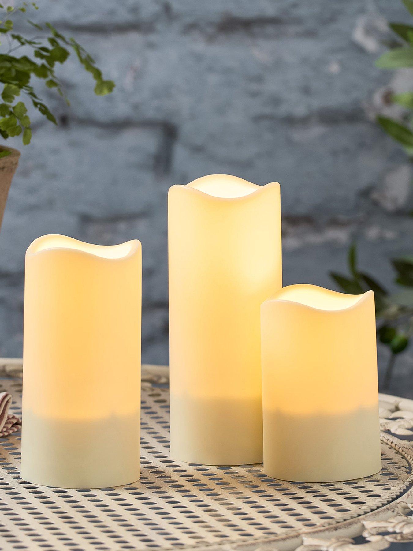 lights4fun-set-of-3-solar-powered-led-candles-ca13500front