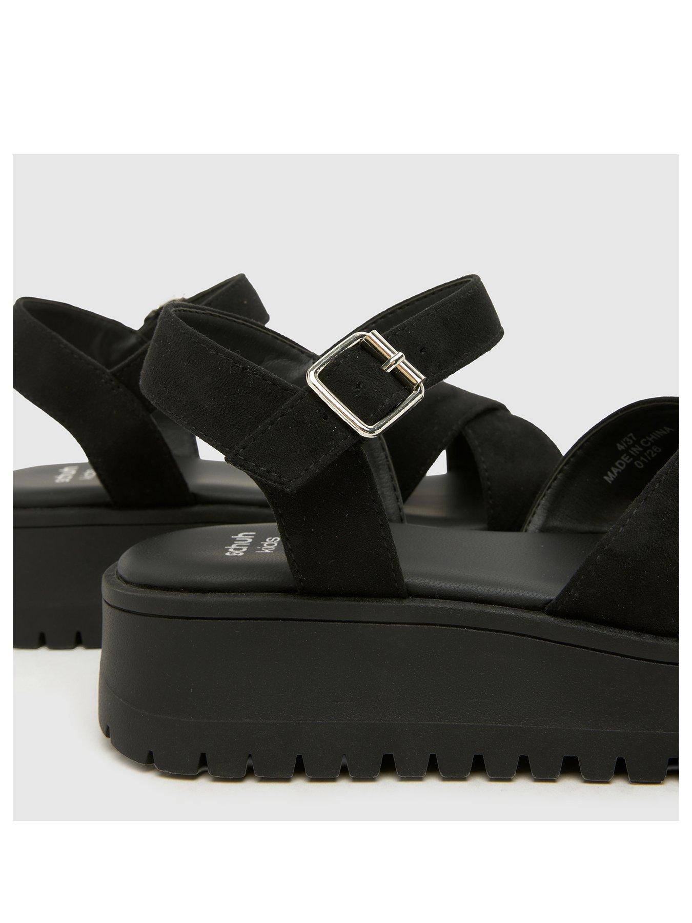 schuh-junior-thankful-cross-strap-sandal-blackstillFront