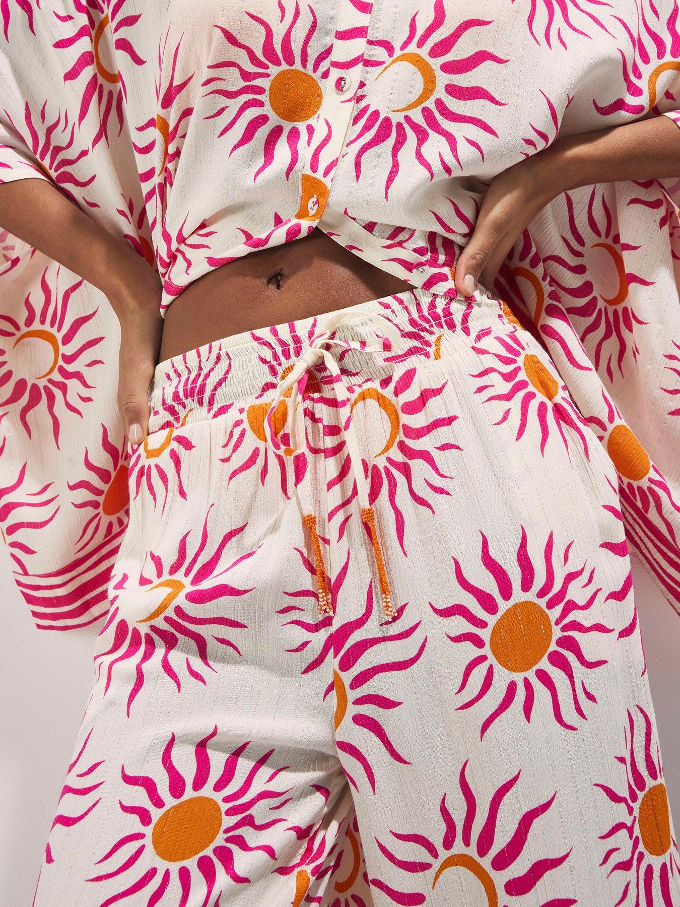 Image 4 of 4 of River Island Wide Leg Sun Print Trouser - White