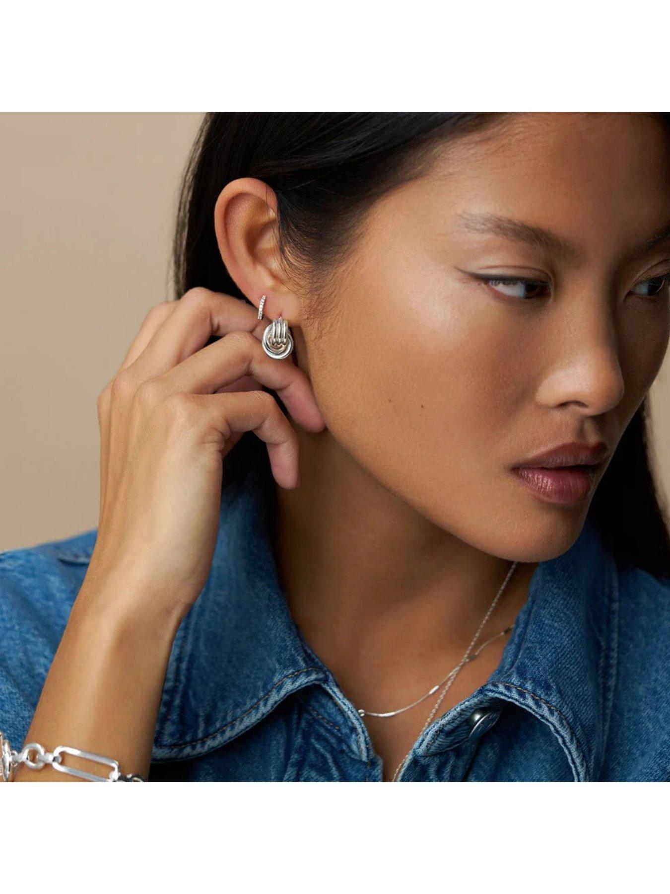 orelia-mini-interlocking-stud-earrings-silverstillFront