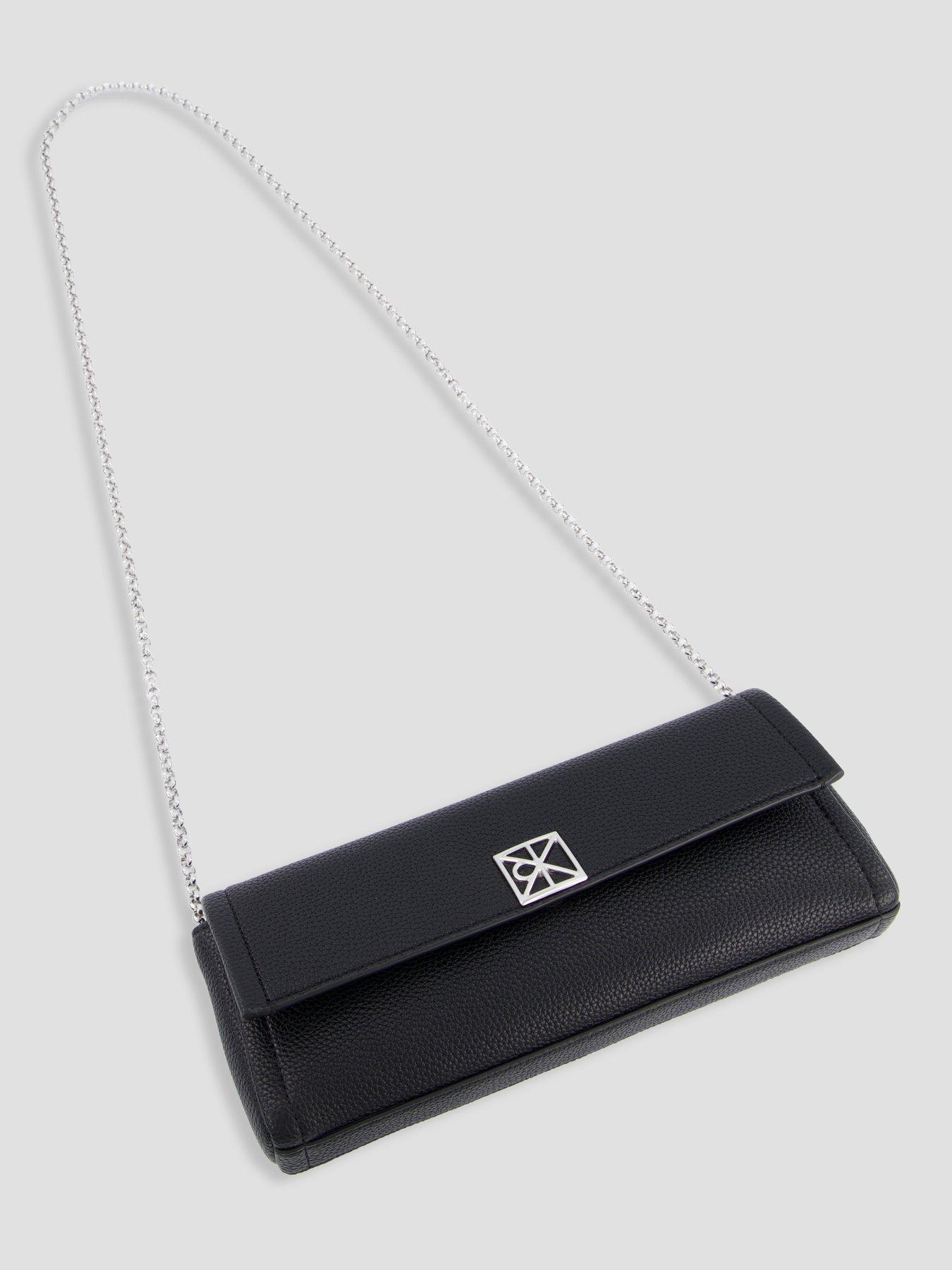 Image 2 of 6 of Calvin Klein Emblem Pebble Clutch Bag - Black