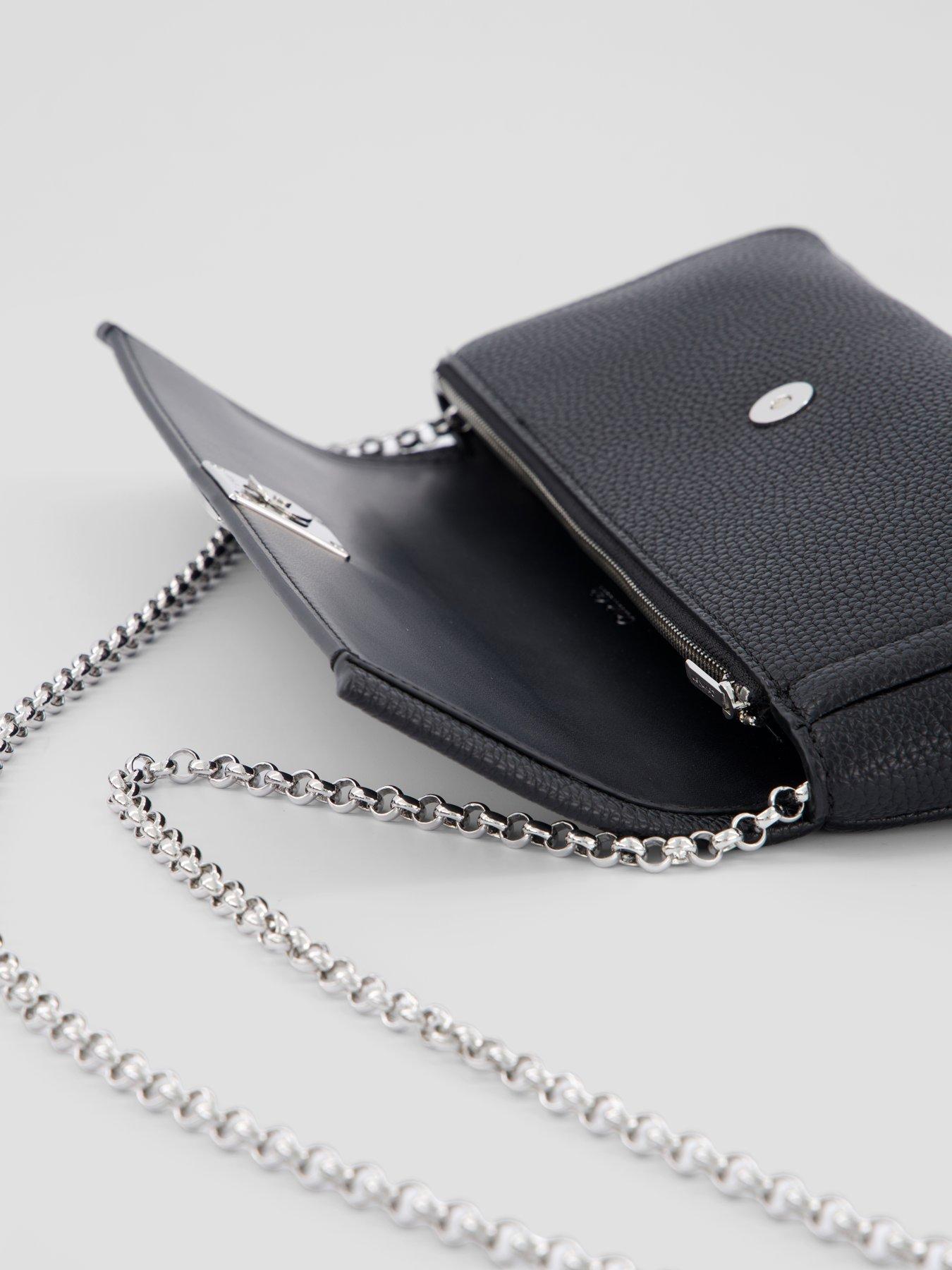 Image 4 of 6 of Calvin Klein Emblem Pebble Clutch Bag - Black