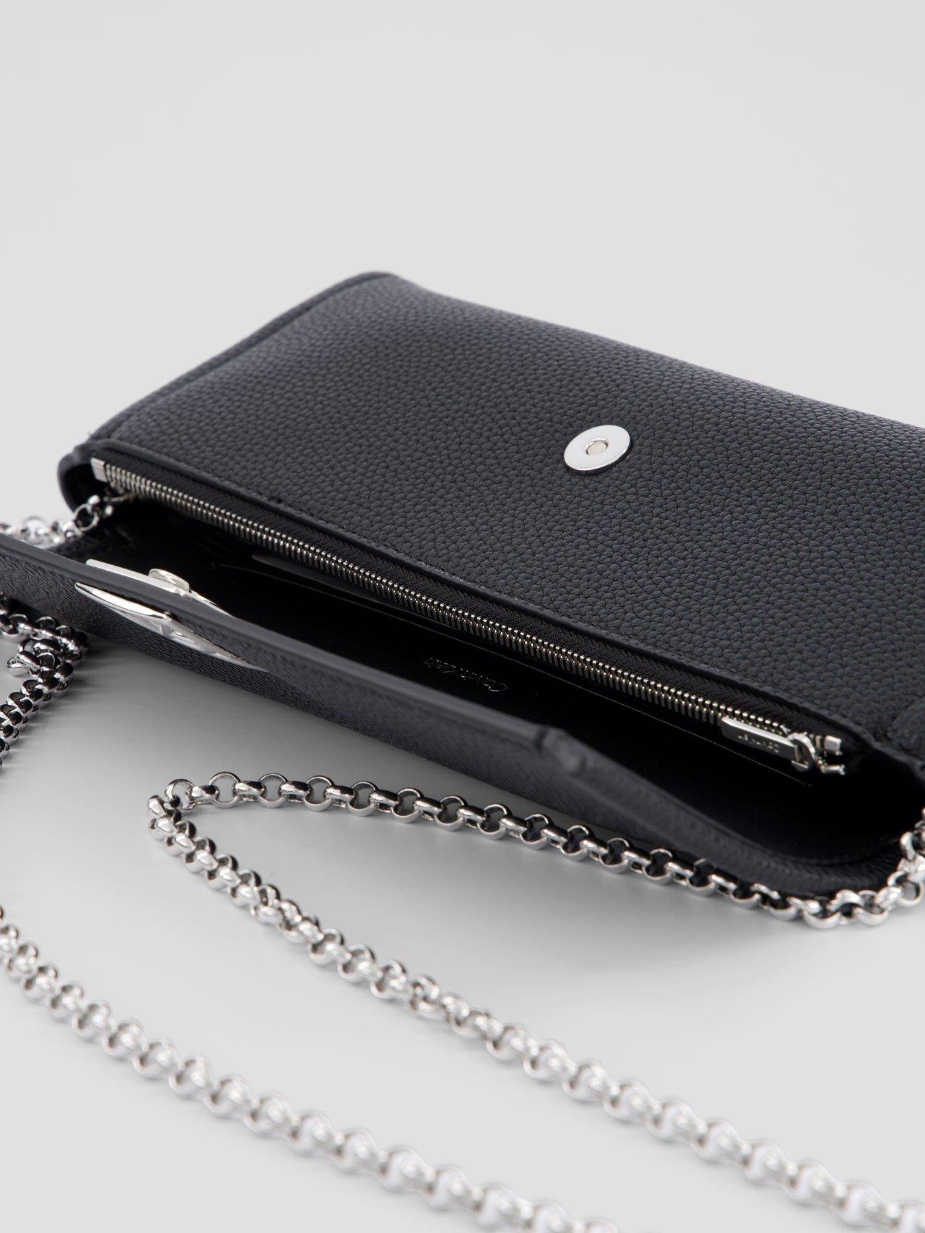 Image 5 of 6 of Calvin Klein Emblem Pebble Clutch Bag - Black