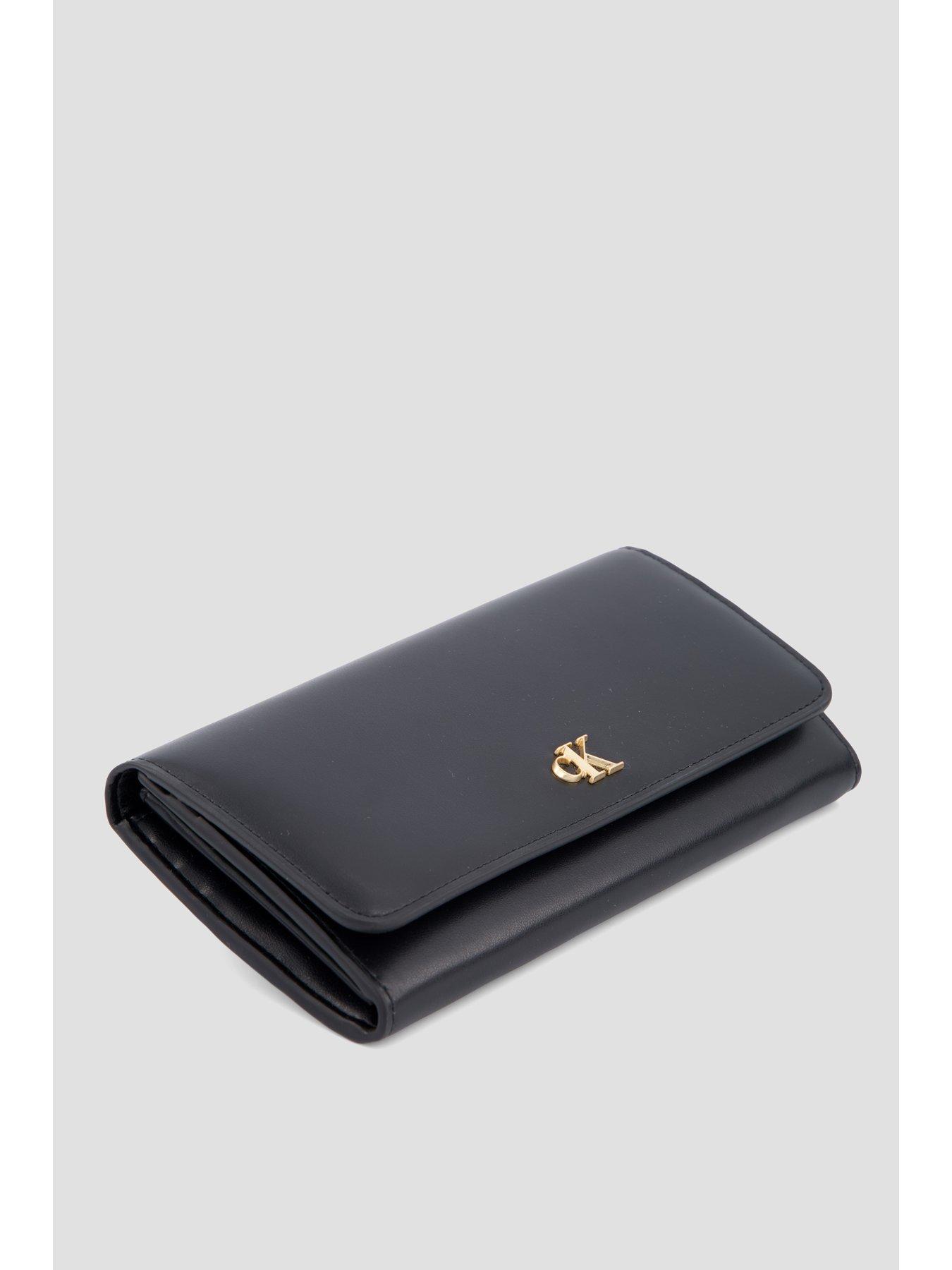 Image 4 of 4 of Calvin Klein Leather Monogram Plaque Flap Wallet - Black