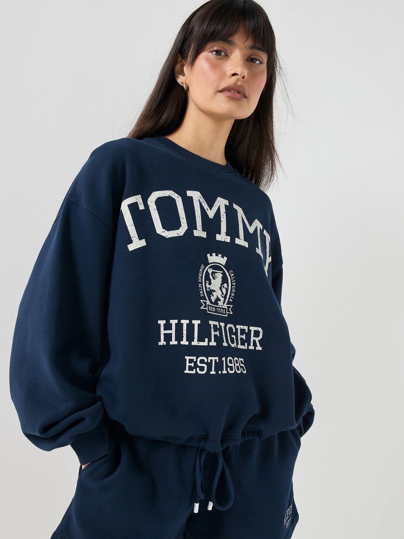 Image 1 of 5 of Tommy Hilfiger Varsity Crest Drawstring Hem Relaxed Sweatshirt - Blue