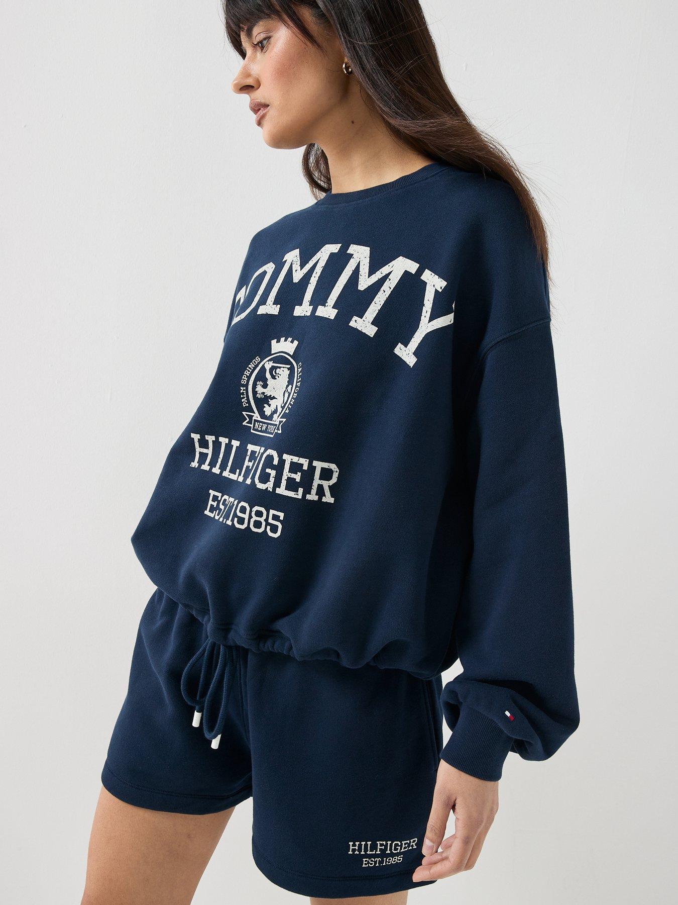 Image 4 of 5 of Tommy Hilfiger Varsity Crest Drawstring Hem Relaxed Sweatshirt - Blue
