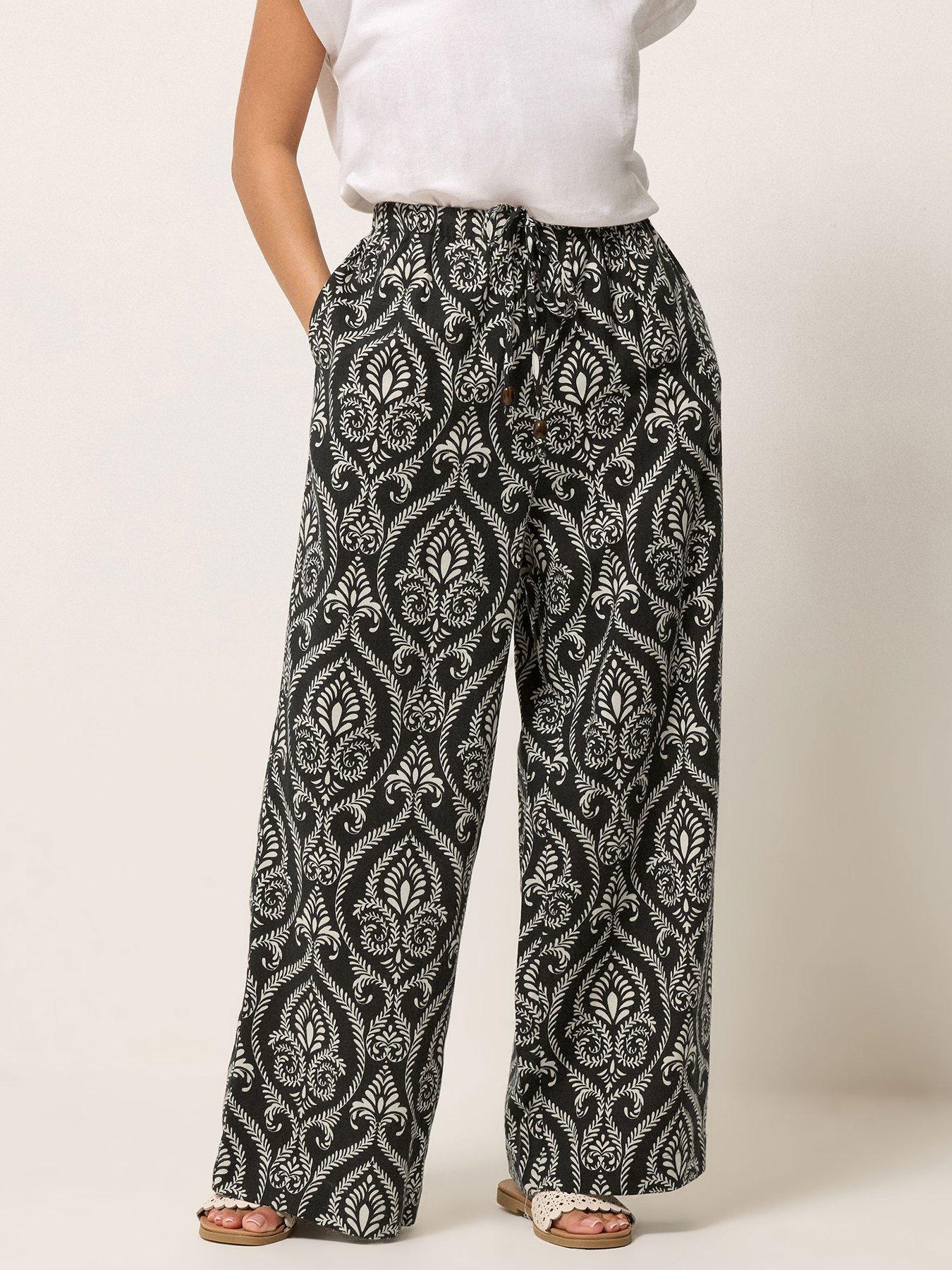 Image 1 of 5 of PixieGirl Petite Tile Print Bead Wide Leg Trousers - Black