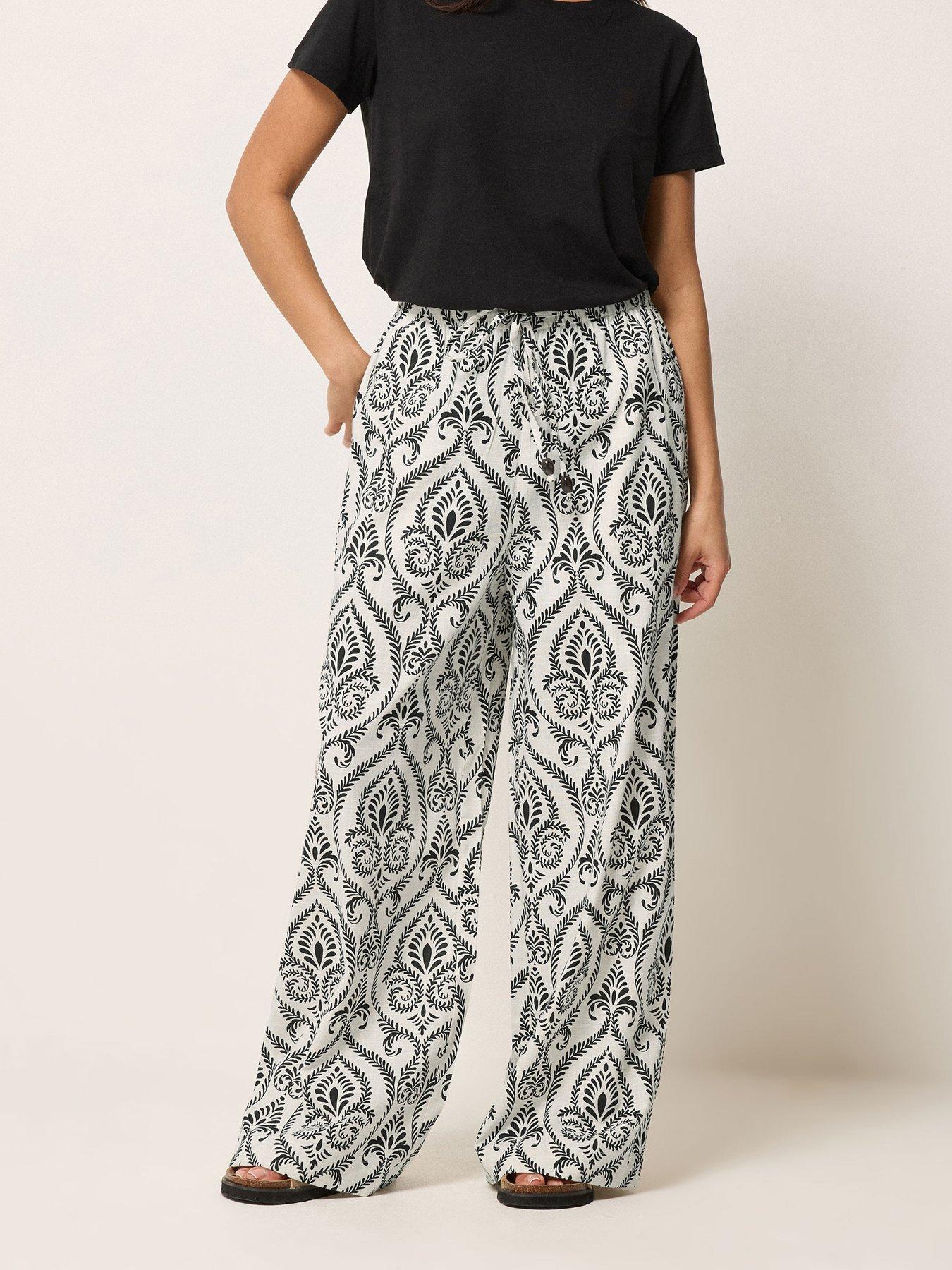 Image 1 of 5 of PixieGirl Petite Tile Print Bead Wide Leg Trousers - Cream