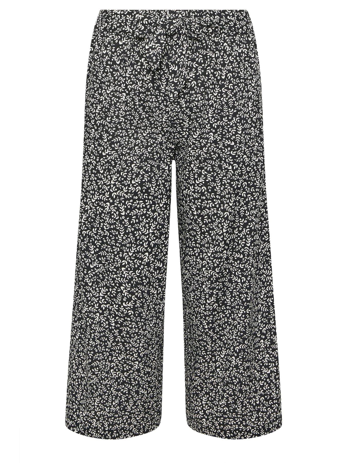 Image 5 of 5 of PixieGirl Petite Leaf Print Wide Leg Crop Trousers - Black