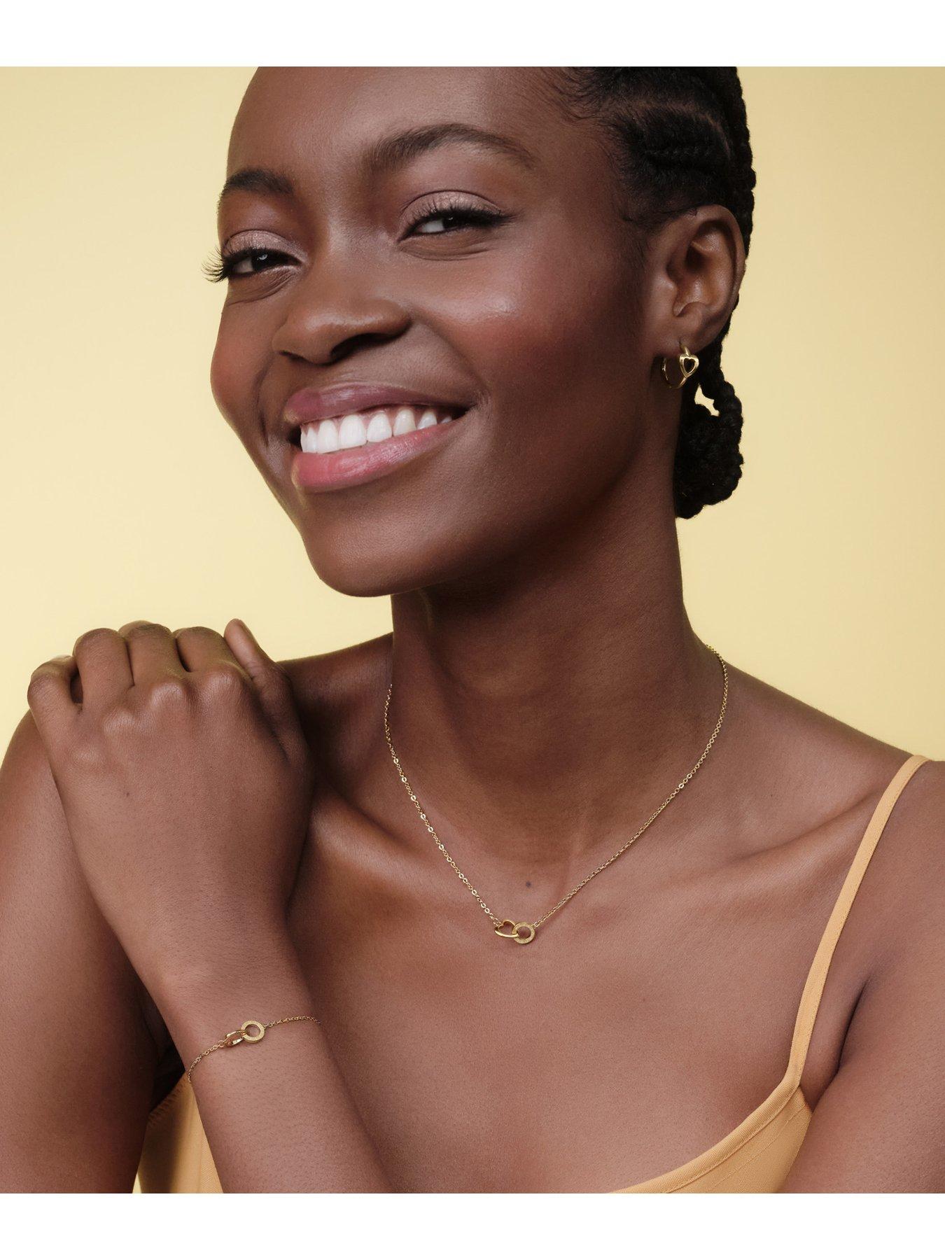 Image 4 of 6 of Olivia Burton Gold IP Kindred Interlink Earrings