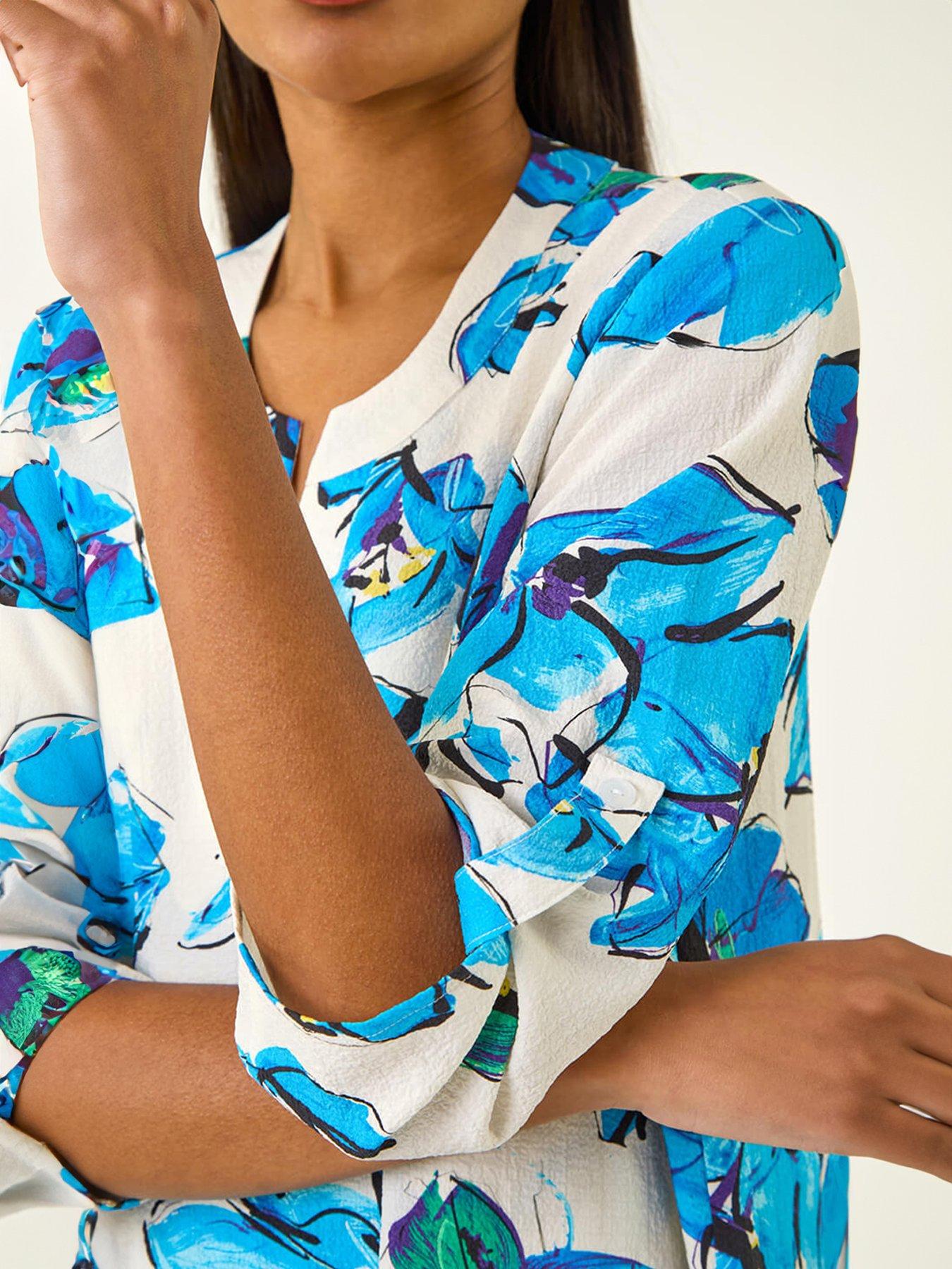 Image 5 of 5 of Roman Floral Wrap Hem Stretch Tunic Top