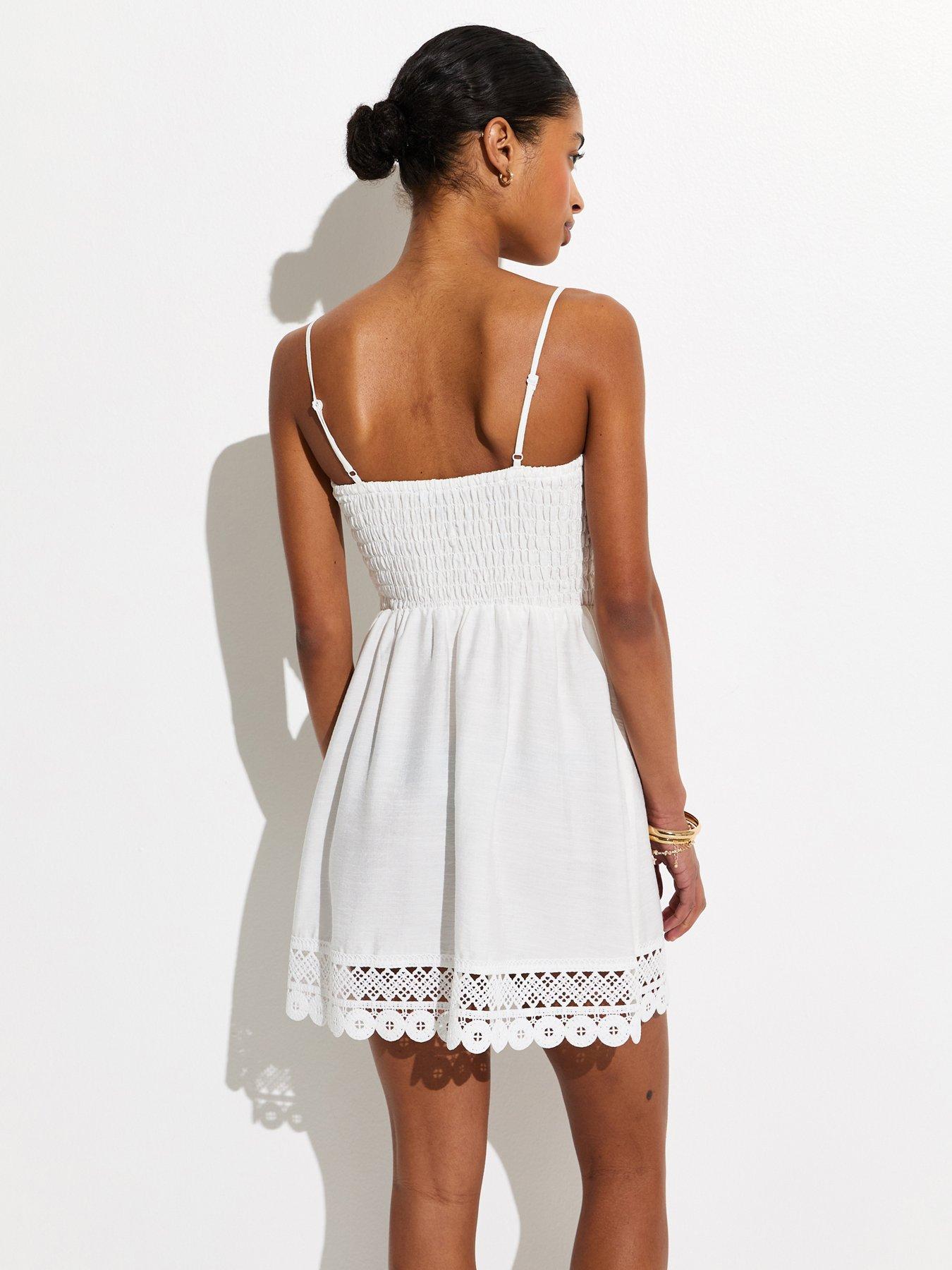 Image 2 of 5 of New Look Lace Trim Shirred Mini Dress - White