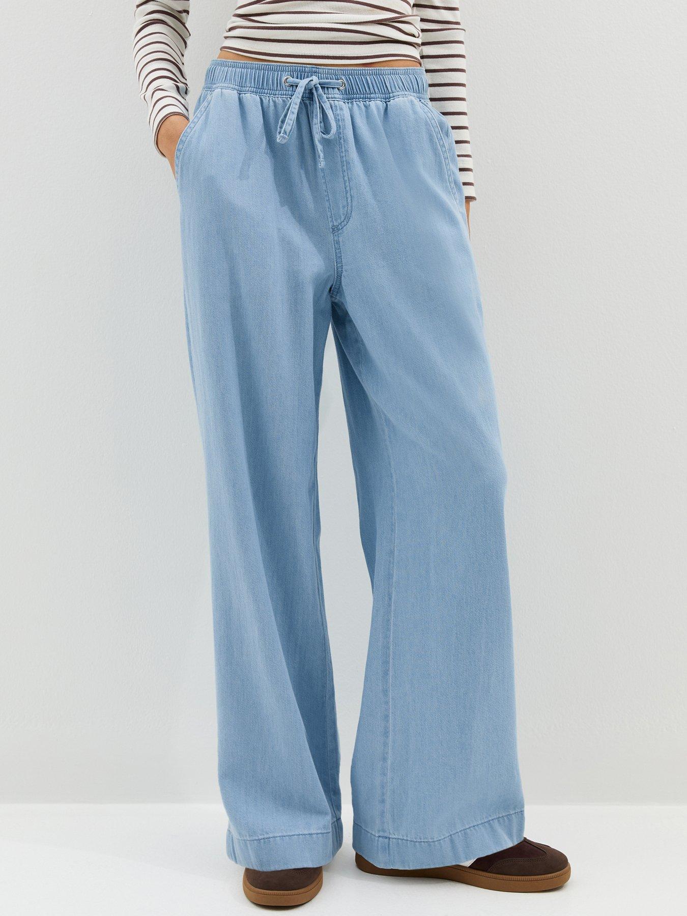 Image 1 of 7 of New Look Denim Drawstring Wide Leg Trousers - Light Blue