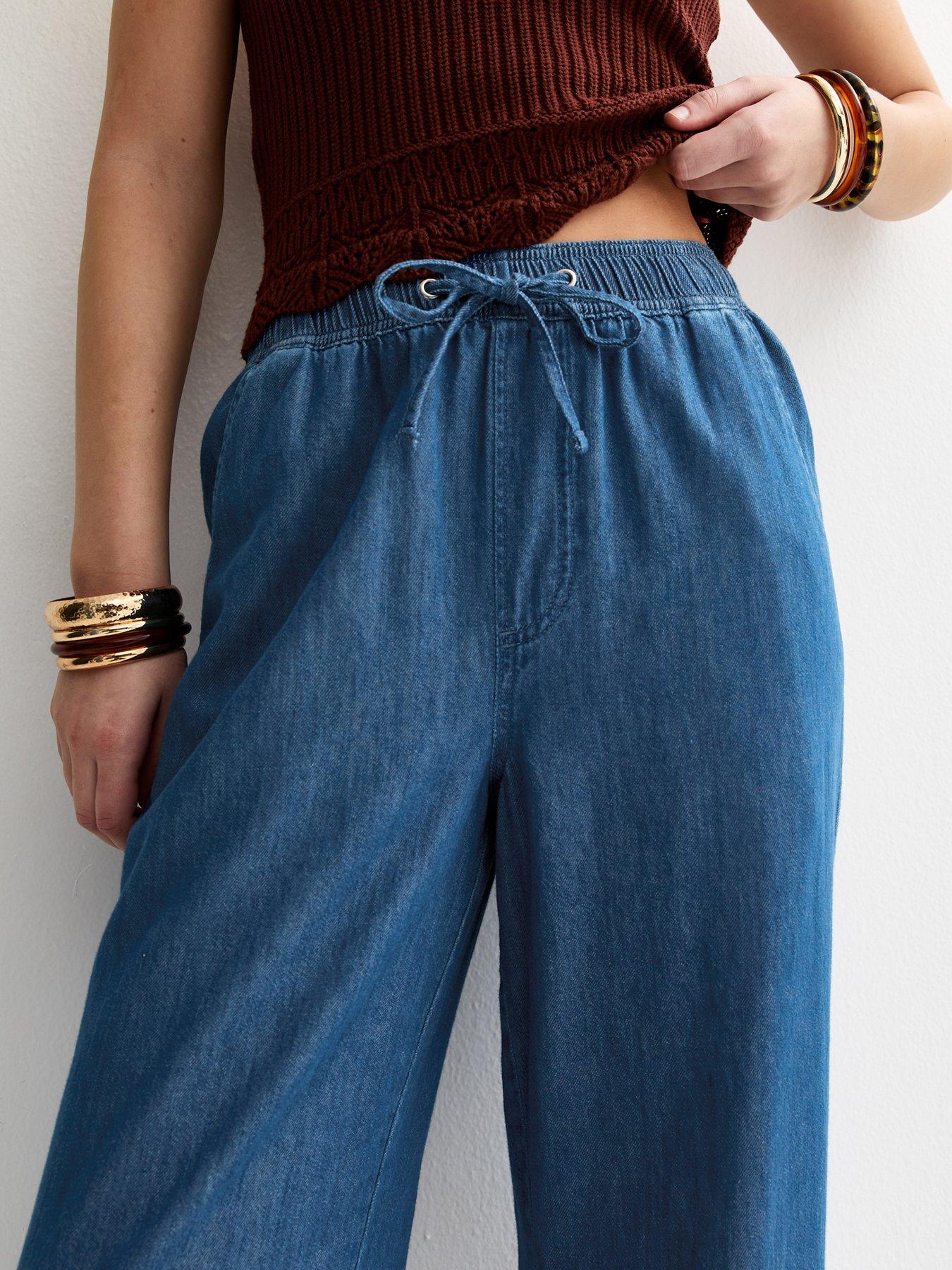 Image 5 of 6 of New Look Denim Drawstring Wide Leg Trousers - Blue