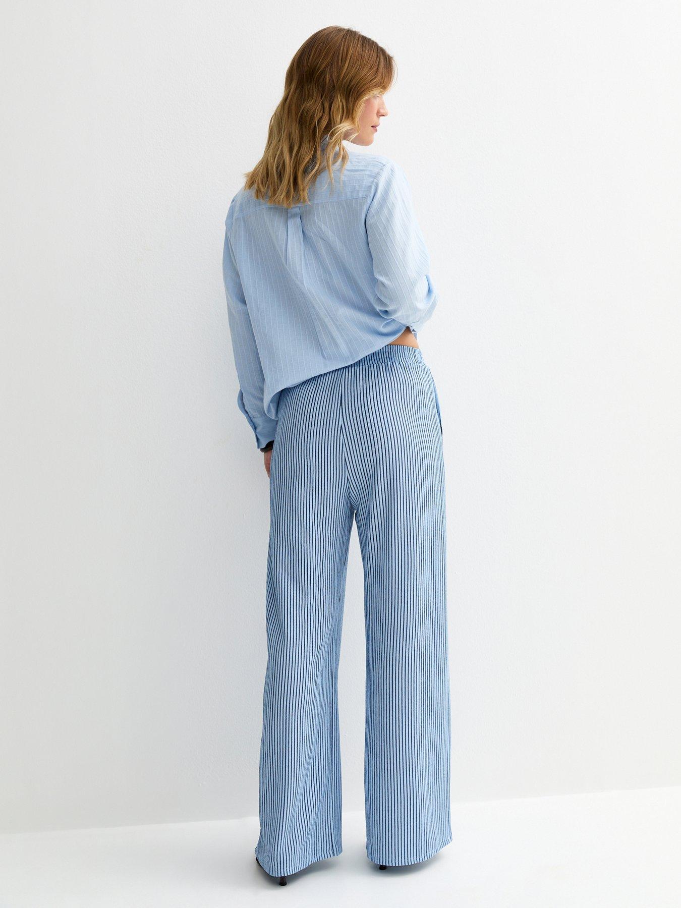 Image 2 of 5 of New Look Thin Stripe Crinkle Texture Wide Leg Trousers - Blue