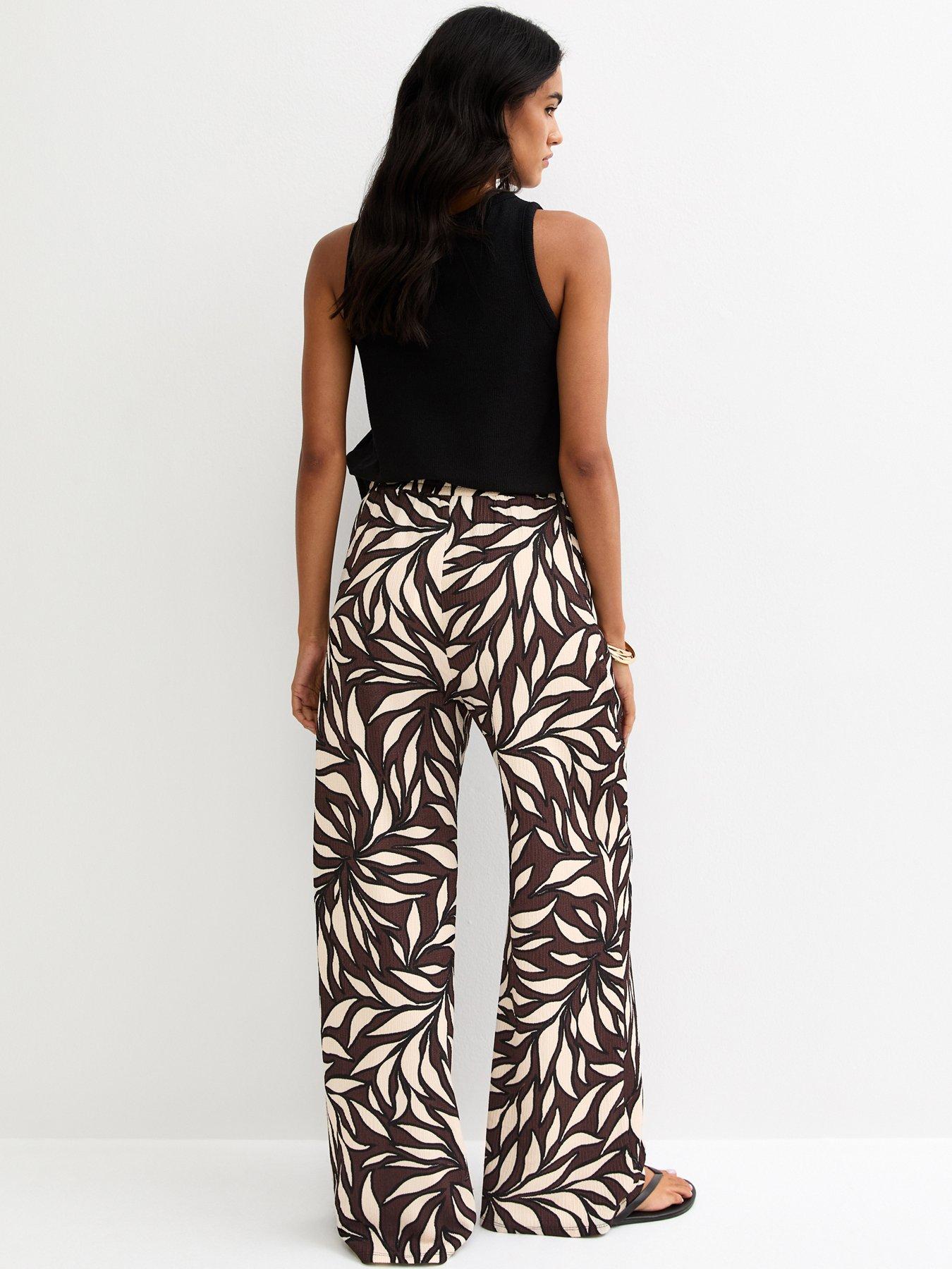 new-look-leaf-print-crinkle-texture-wide-leg-trousers-brownstillFront