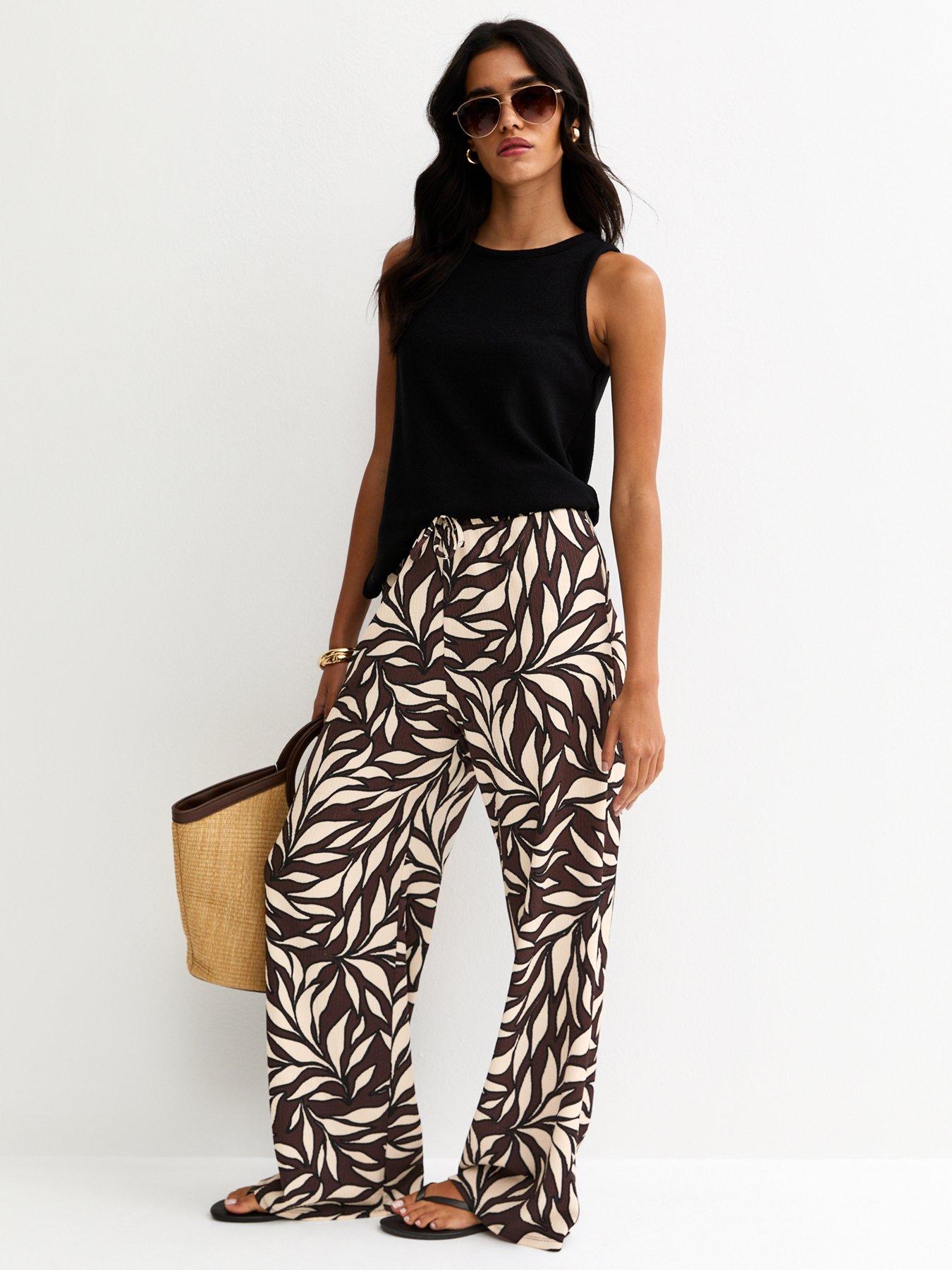 new-look-leaf-print-crinkle-texture-wide-leg-trousers-brownback